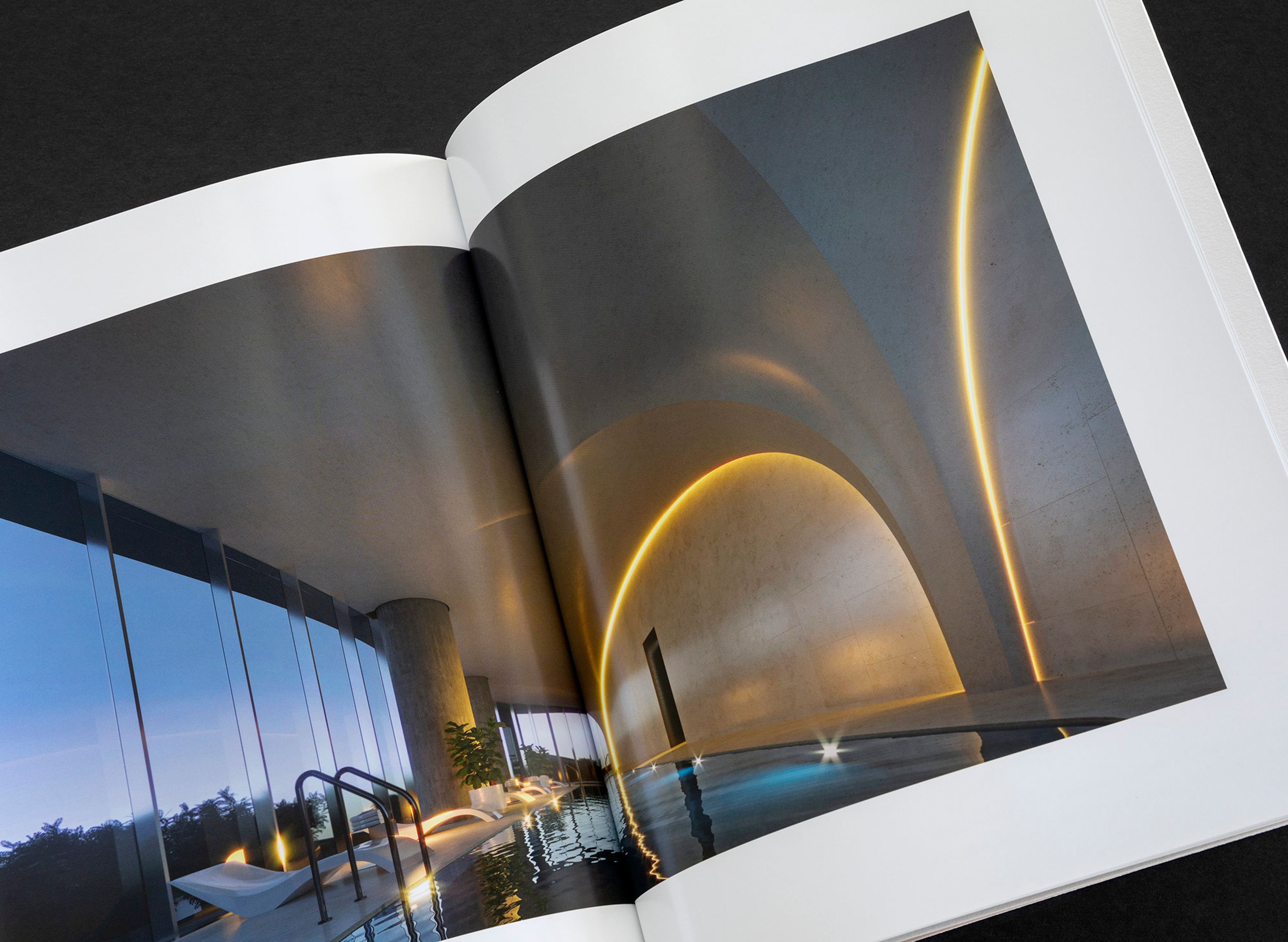 a book is open to a page with a picture of a swimming pool .