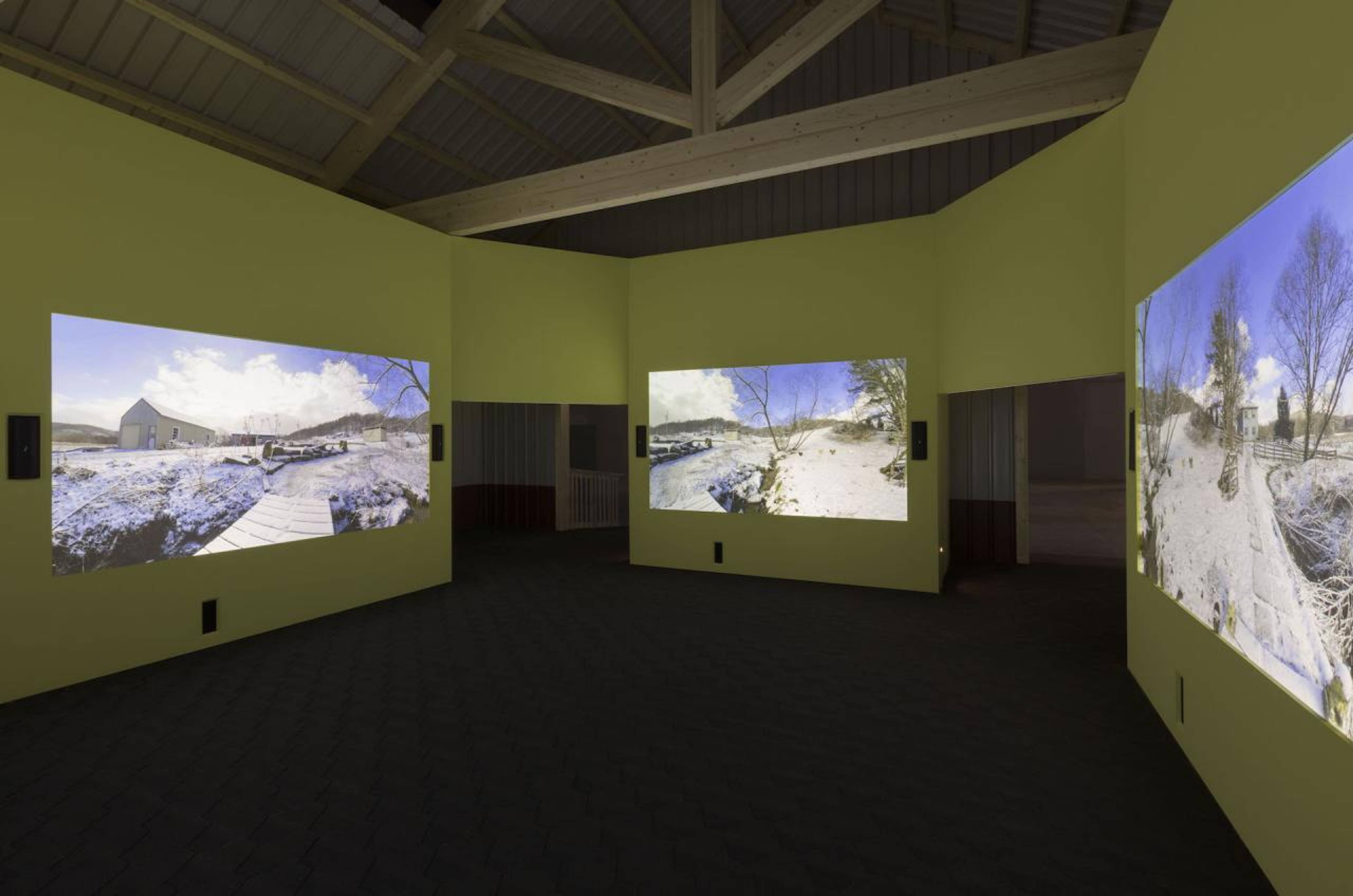 Exhibition view of &ldquo;Lizzie Fitch | Ryan Trecartin: Whether Line&rdquo;, Fondazione Prada, 2019 Photo Andrea Rossetti, Courtesy Fondazione Prada Lizzie Fitch | Ryan Trecartin, Property Bath, 2019 with Rhett LaRue 4 channel 4K video, color, sound. Wood, sheet metal, drywall, paint, PVC siding, bituminous sheath, fabric, stanchions, fans, lights, ambient sound