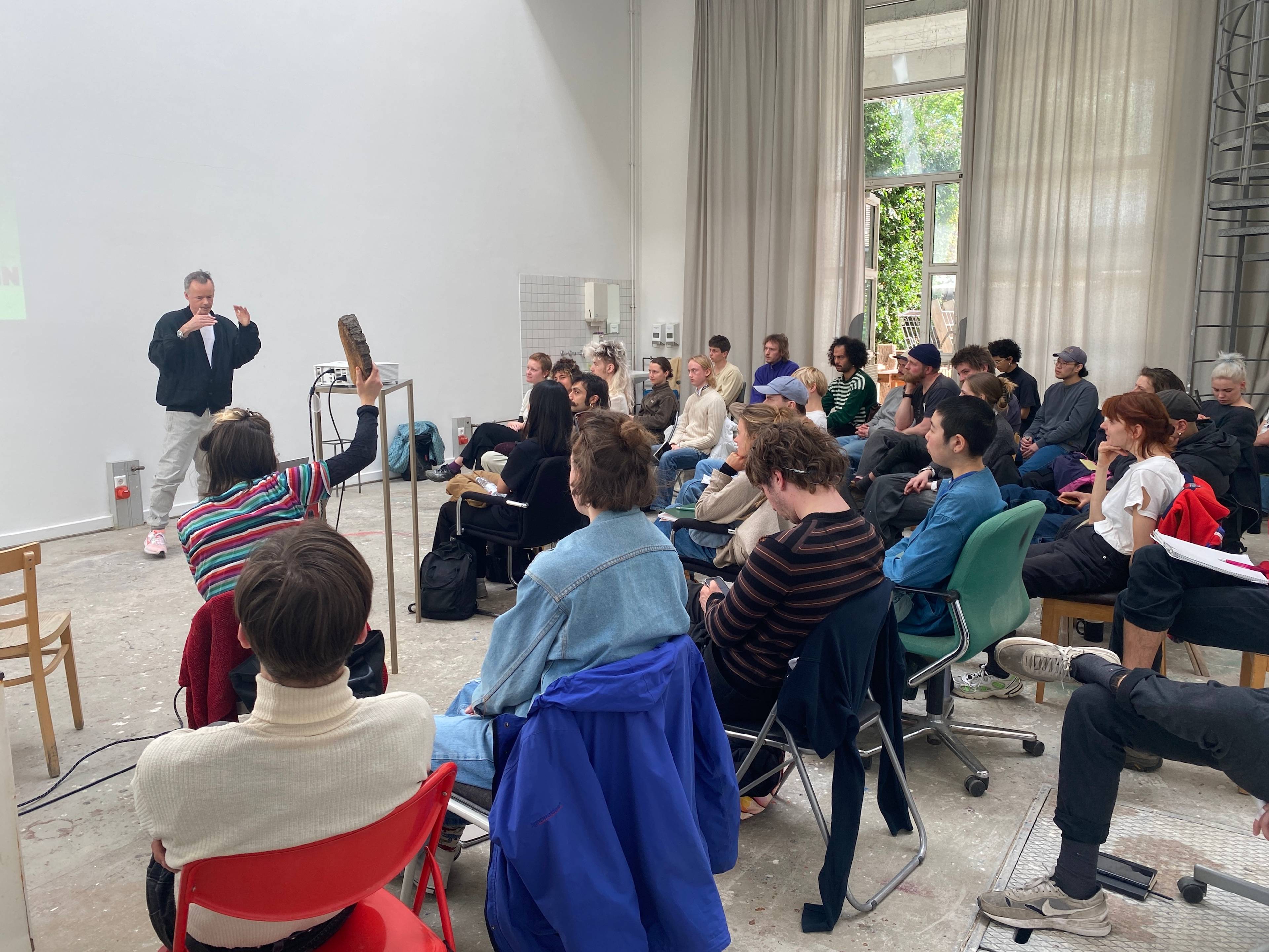 Andrew Cannon speaking during his lecture titled Welcome to the Jungle, Kunstakademie Karlsruhe, 2024