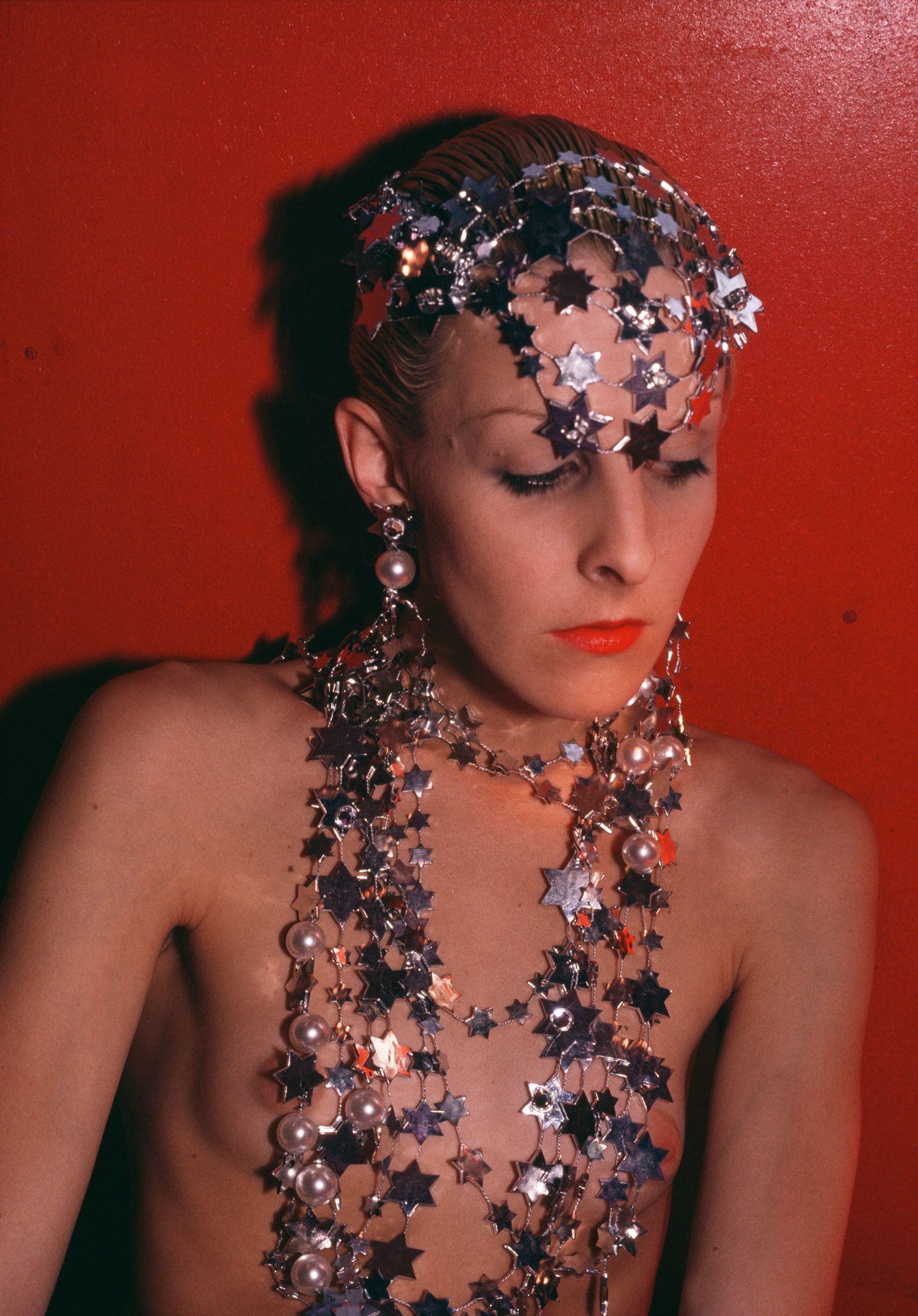 Nan Goldin, Greer modeling jewelry, NYC, 1985