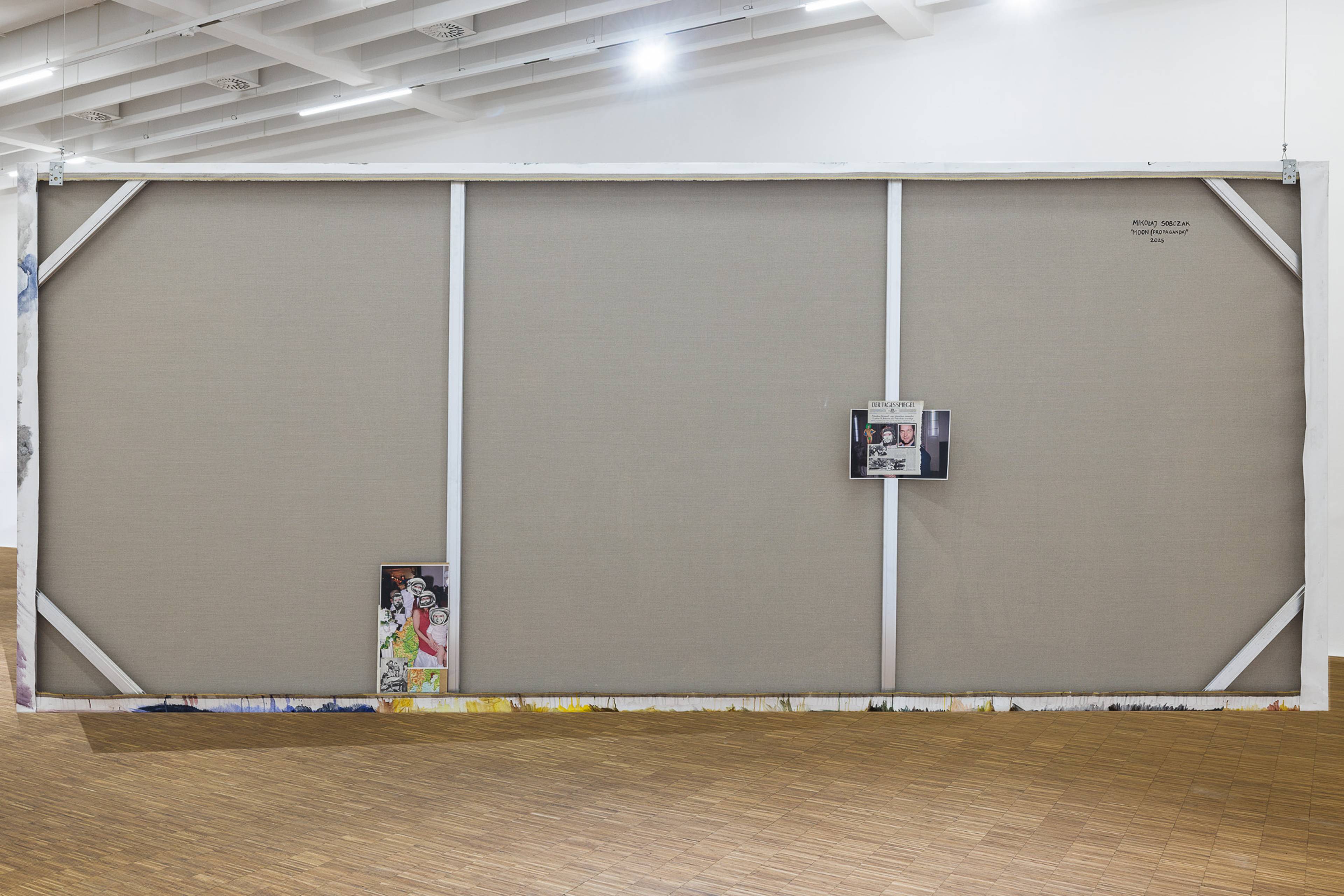 Collages on the back of Moon (Propaganda), 2025