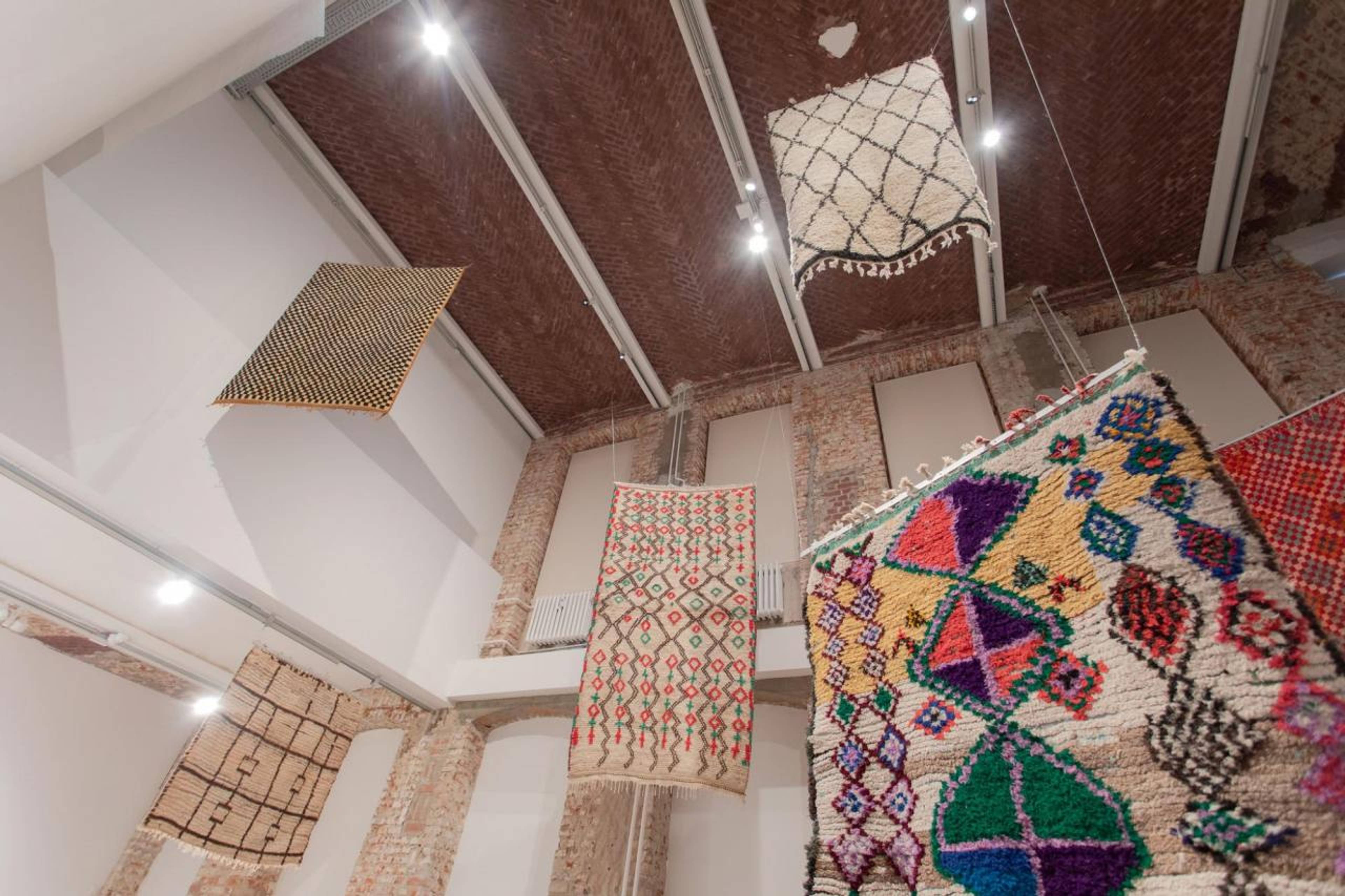 Myriam El Haïk, Please Patterns , 2022, installation and performance for drawings, rugs, and piano. Installation view, “12th Berlin Biennale,” KW Institute for Contemporary Art, 2022, Berlin. Photo: Silke Briel