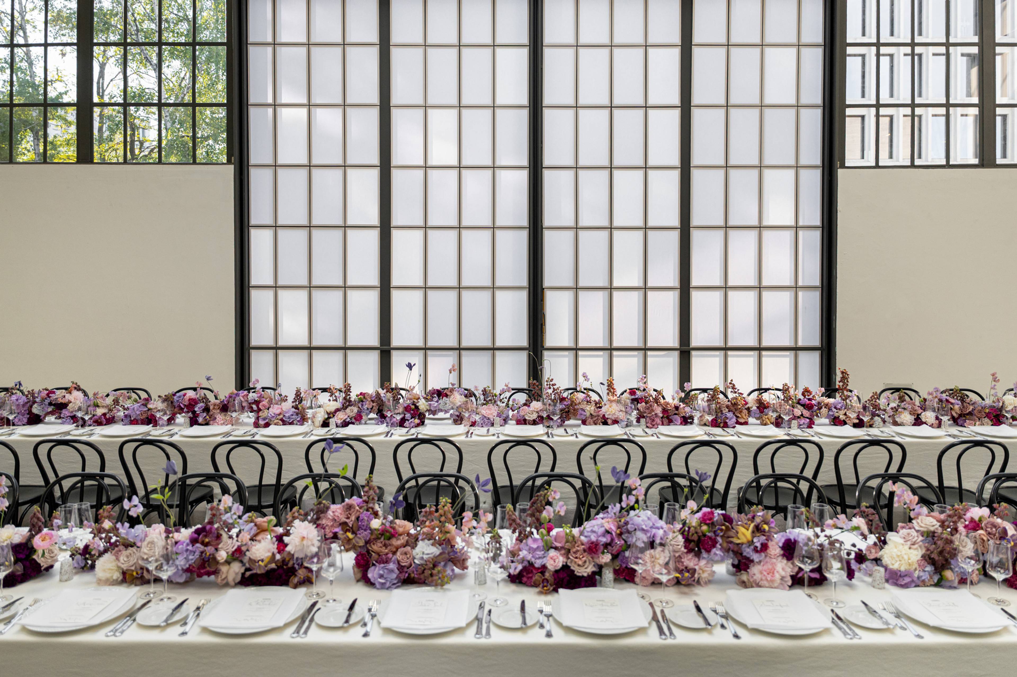 Tables set for the dinner opening “embrace”