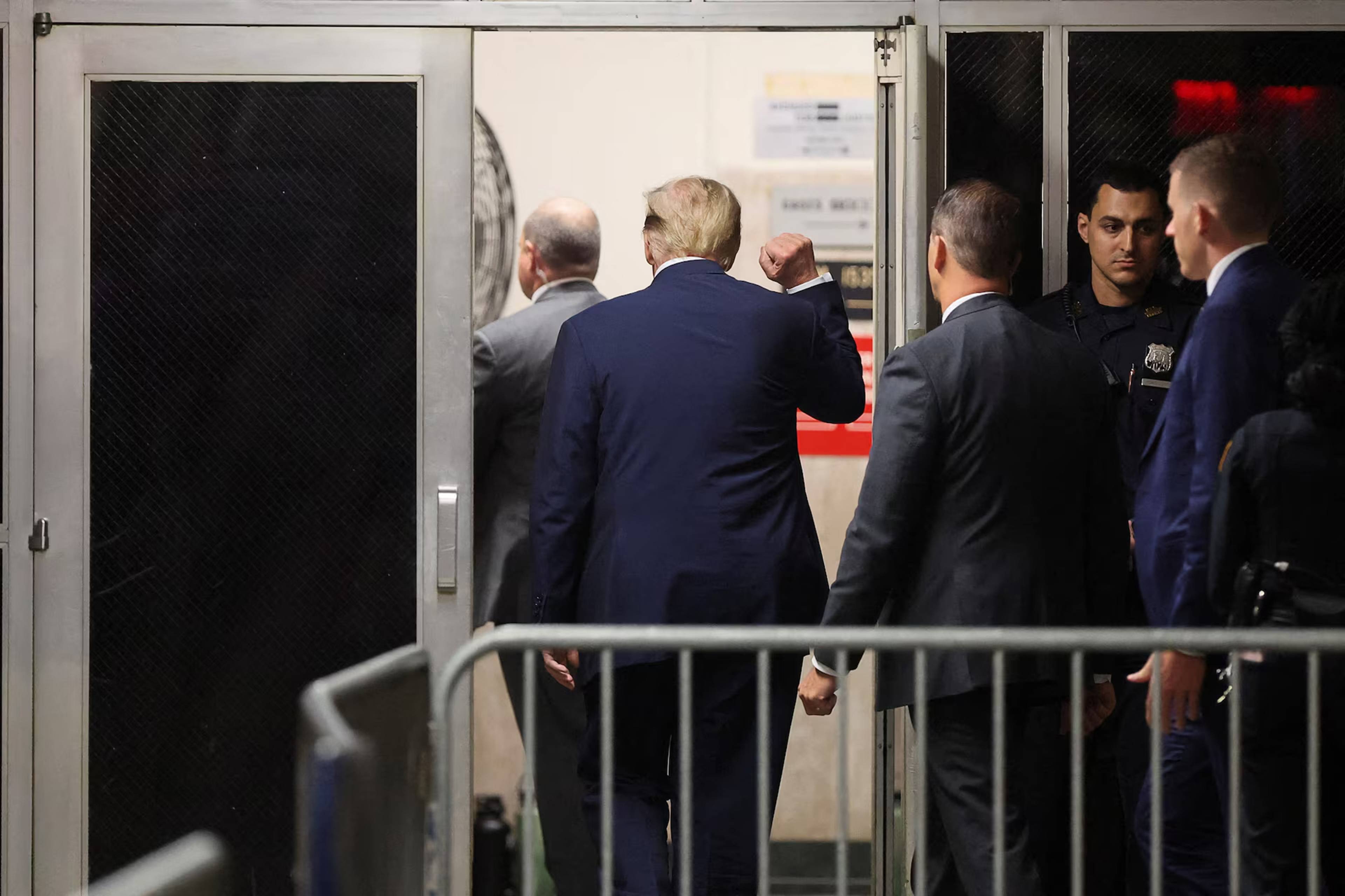 Former U.S. President Donald Trump gestures