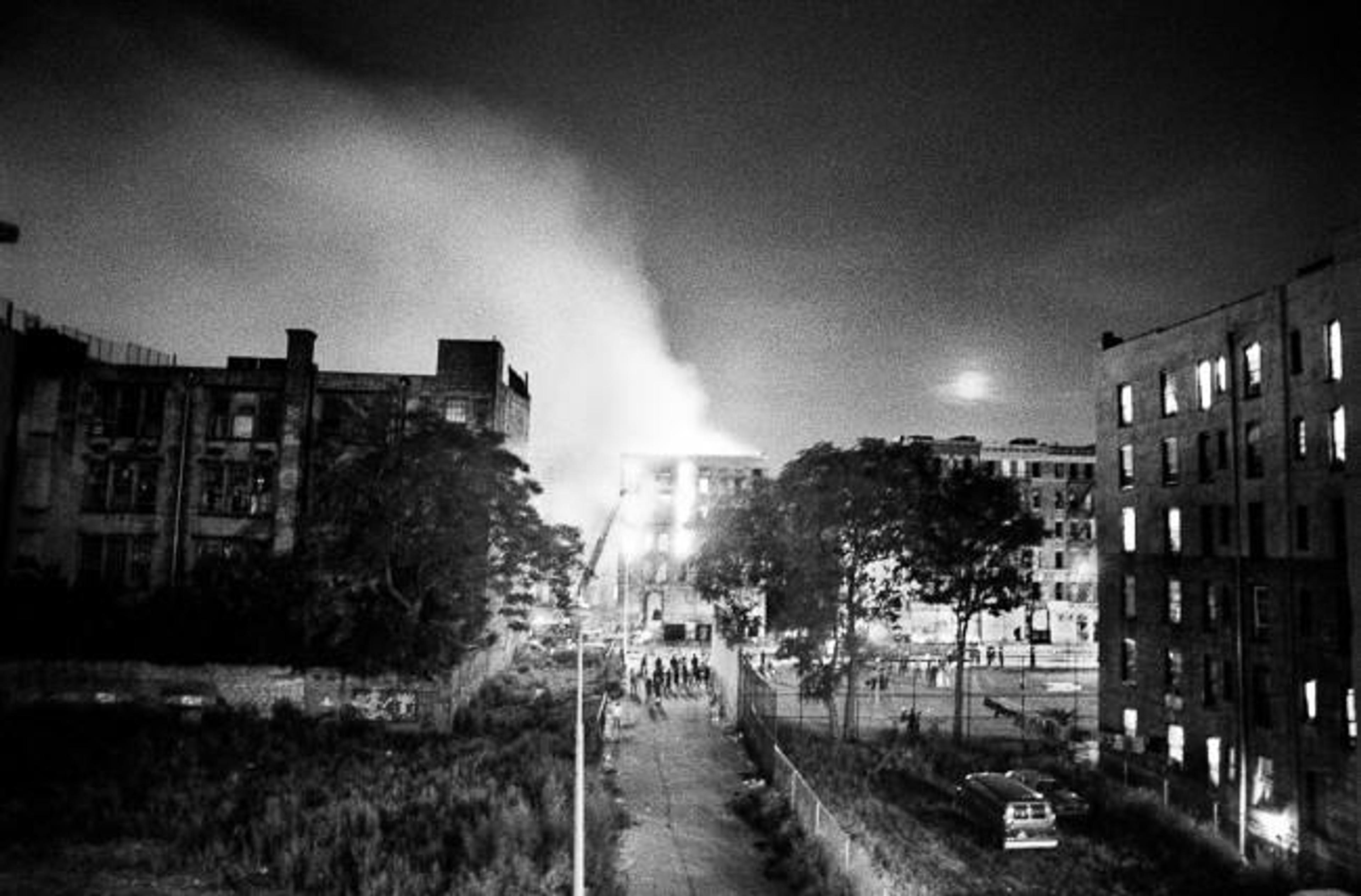 Ken Schles Burning Building with Moonrise, East 4th Street  (1984) from the series &quot;Invisible City&quot;