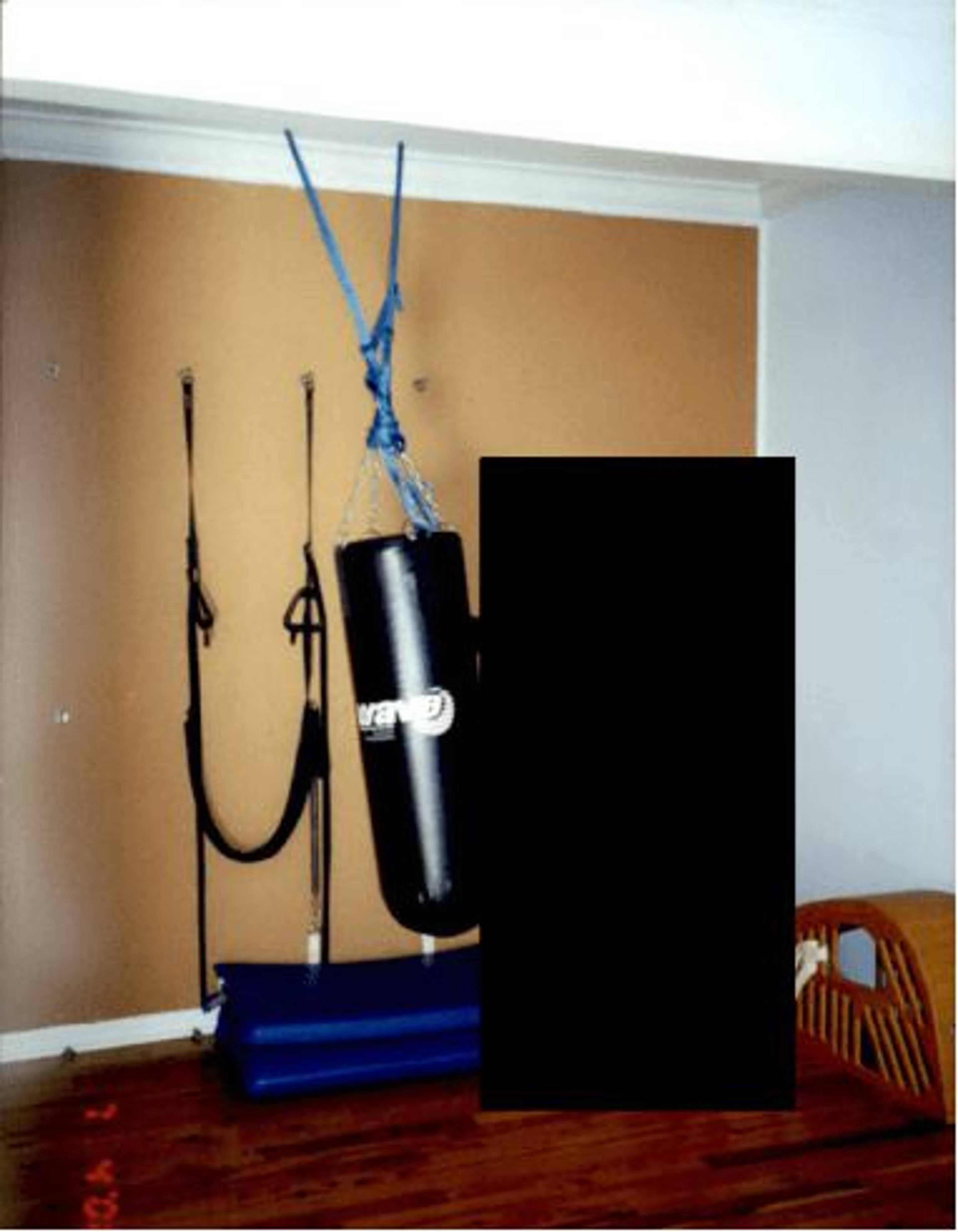 Redacted photograph, Epstein Files (Data Set 3, EFTA00004012). Courtesy: US Department of Justice