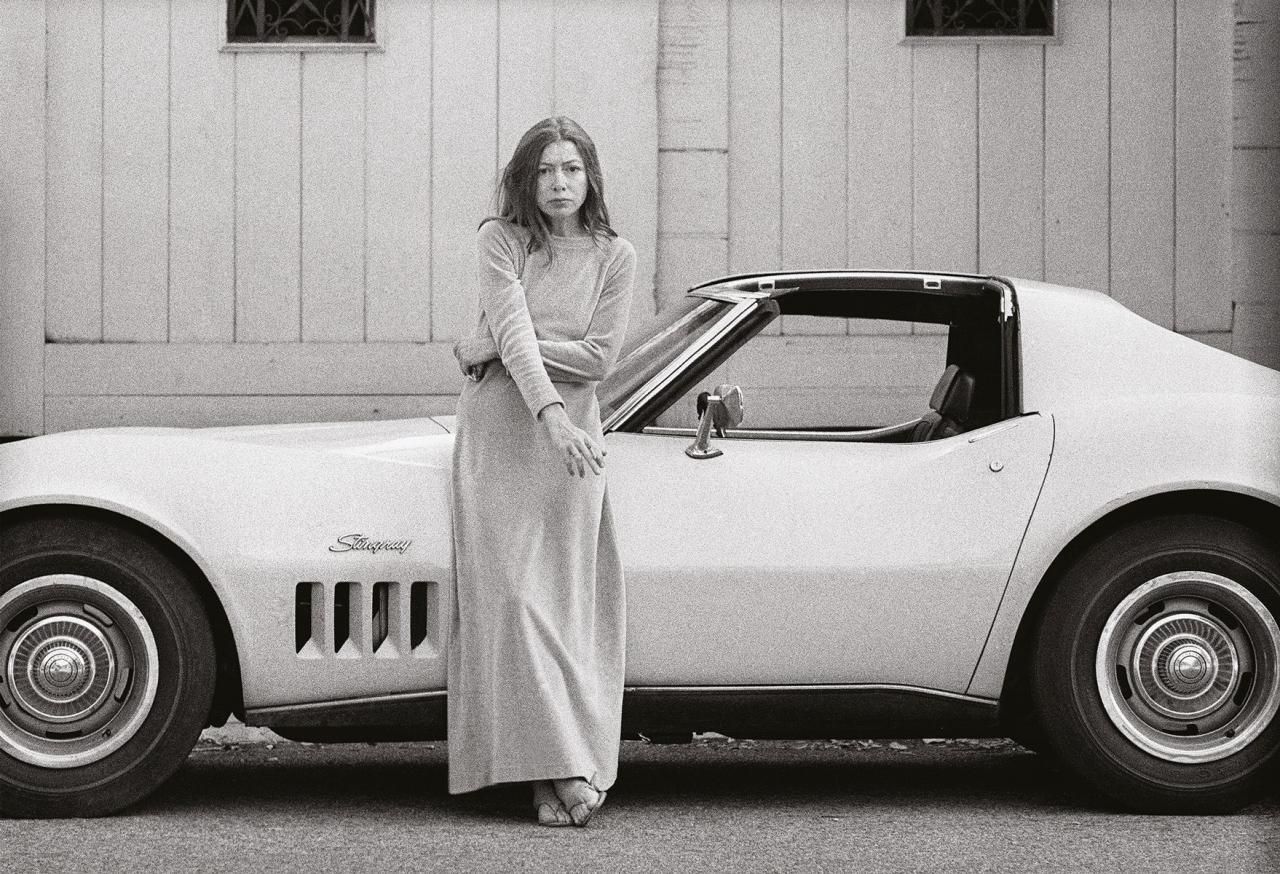 Joan Didion in front of her Stingray Corvette, 1968. Photo: Julian Wasser 