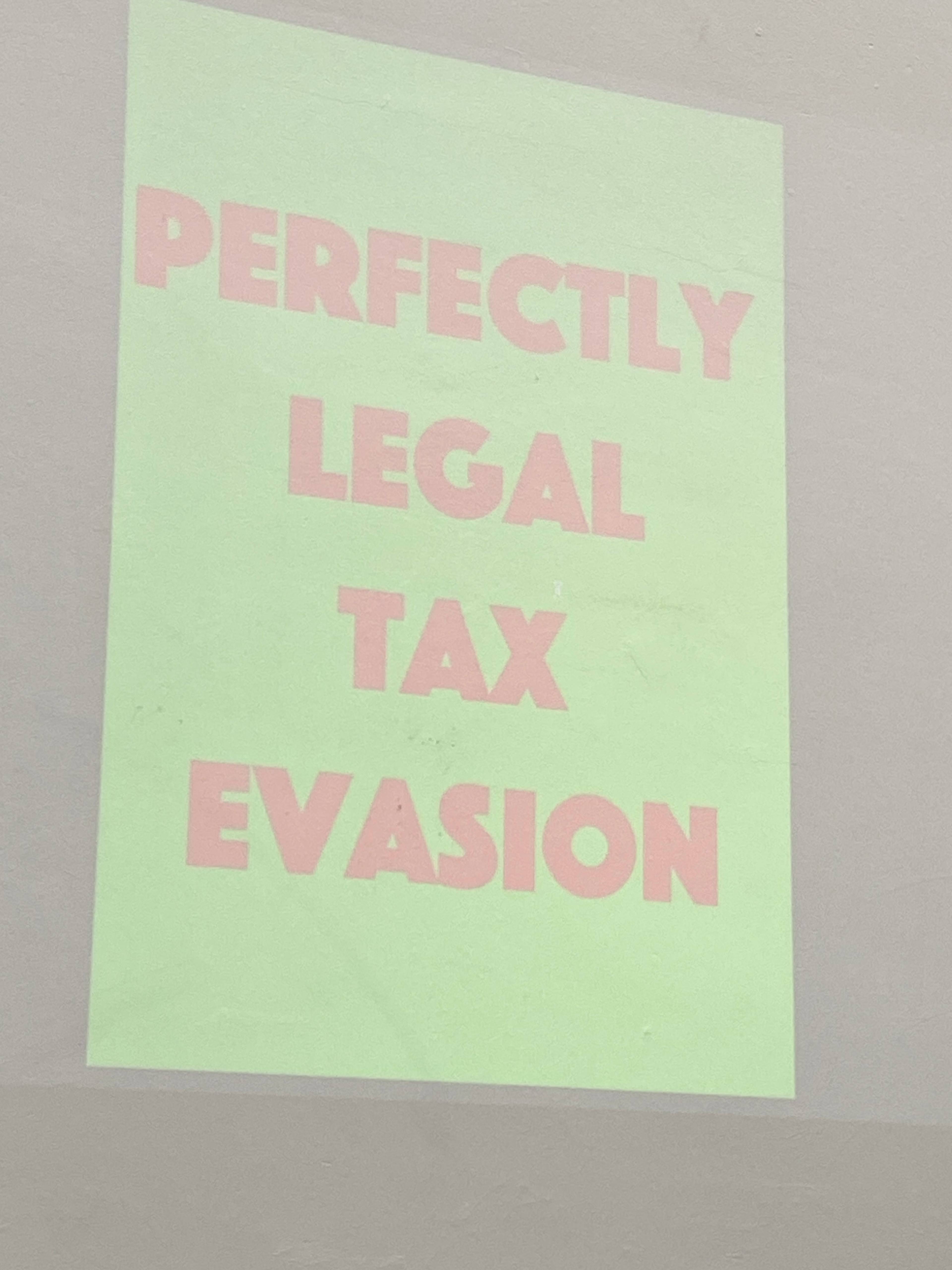 Andrew Cannon speaking during his lecture titled Welcome to the Jungle, with presentation visuals in the background, Kunstakademie Karlsruhe, 2024