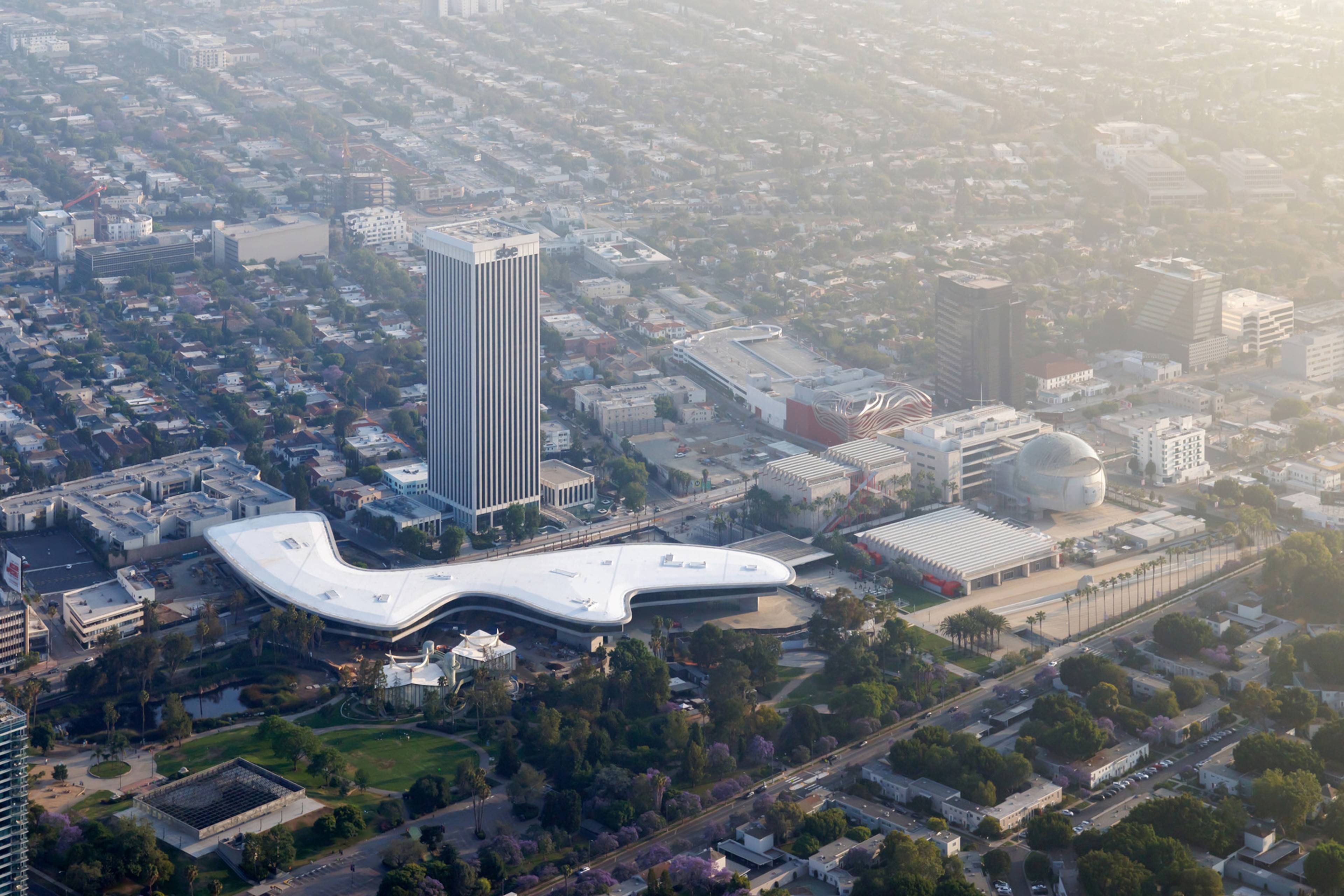 Aerial view of LACMA buildings, including David Geffen Galleries in context of Miracle Mile