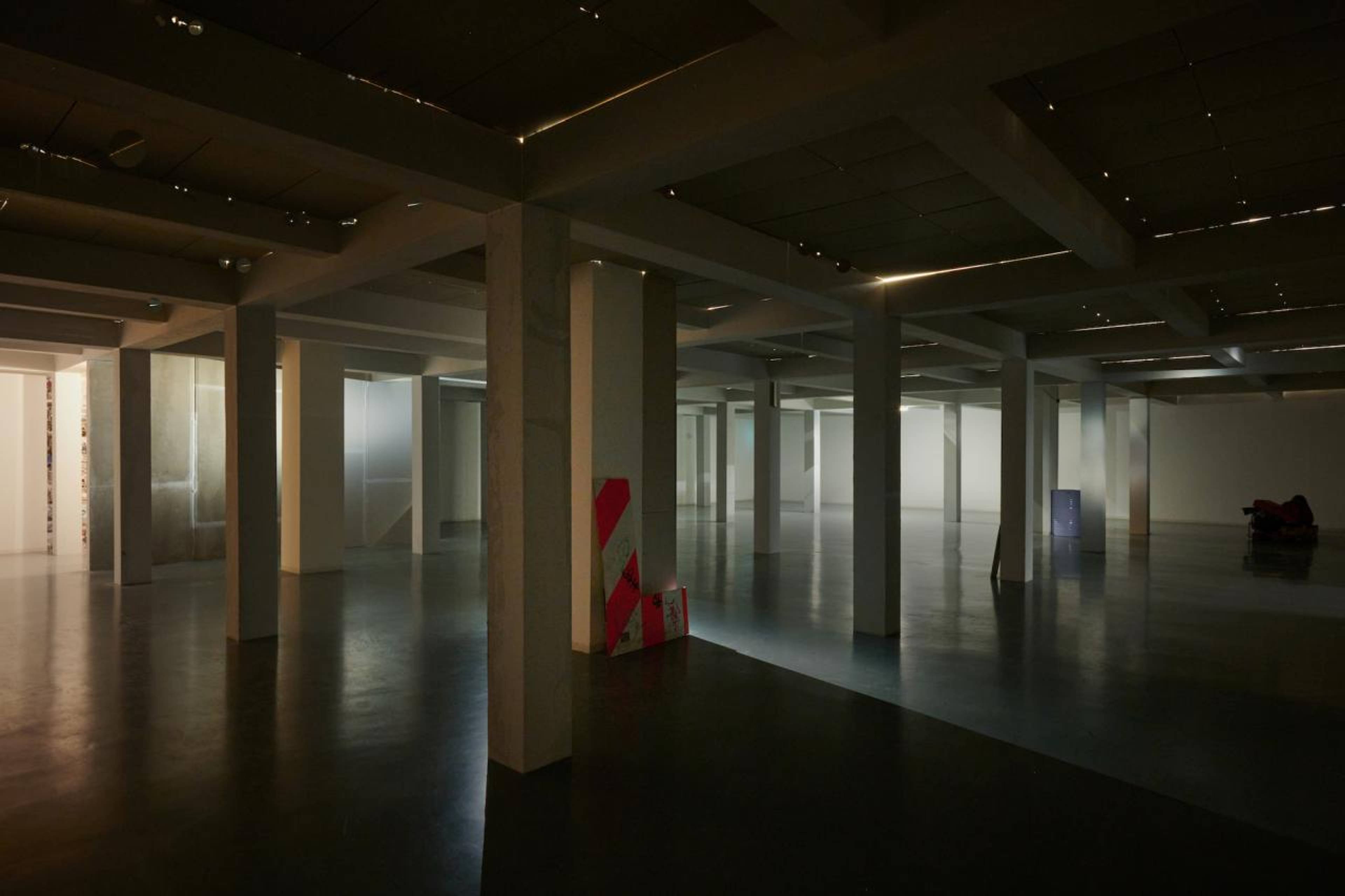 Tolia Astakhishvili, Entire, 2023, plasterboard, padding material, ventilation grille, pipes, construction sign, gym mats, punching bag, artificial snow, lamps, sound, 6 m ceiling lowered to 3 m x 15 m x 23 m