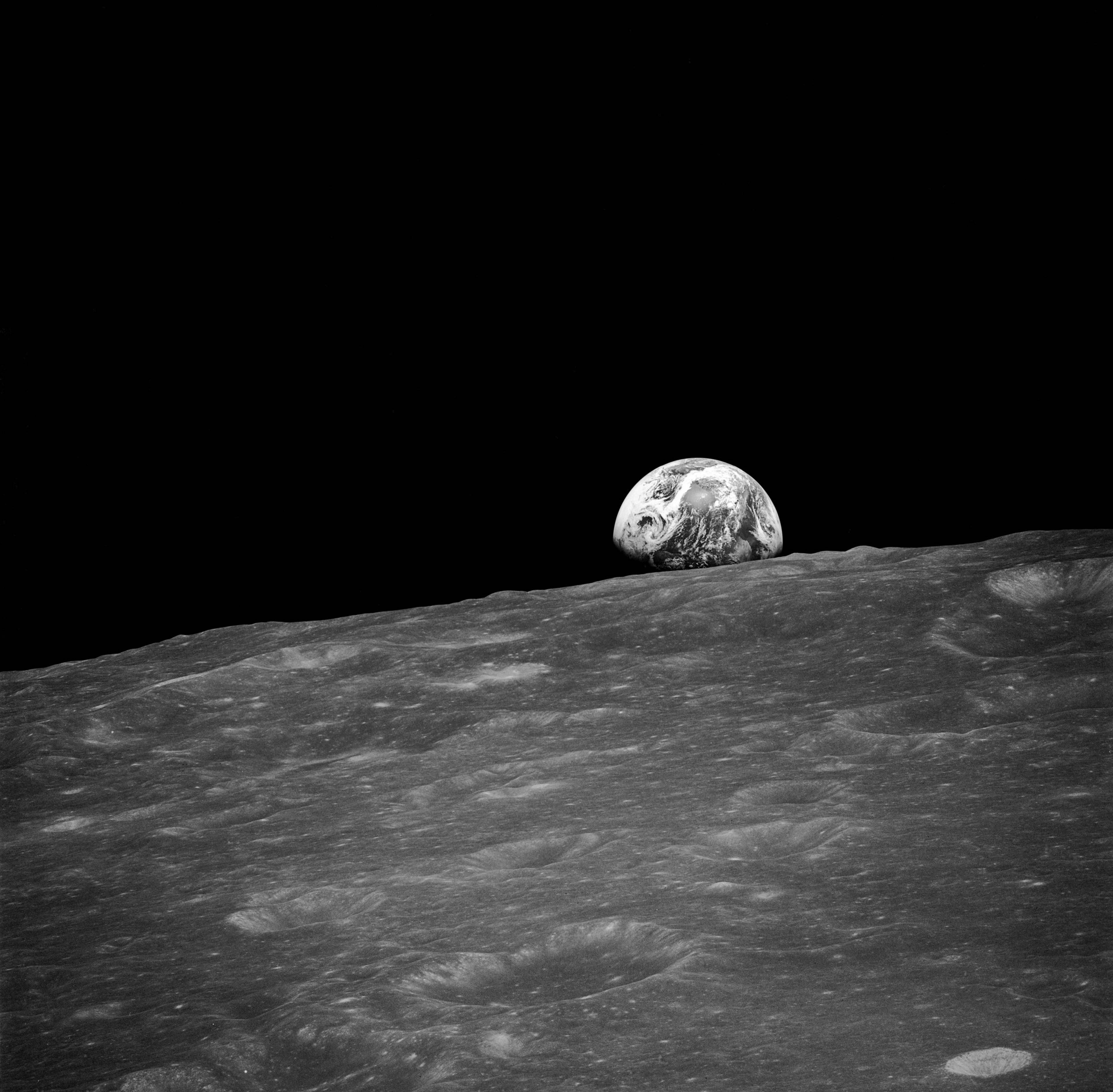 The first photograph of Earth from the Moon, taken shortly before Earthrise.