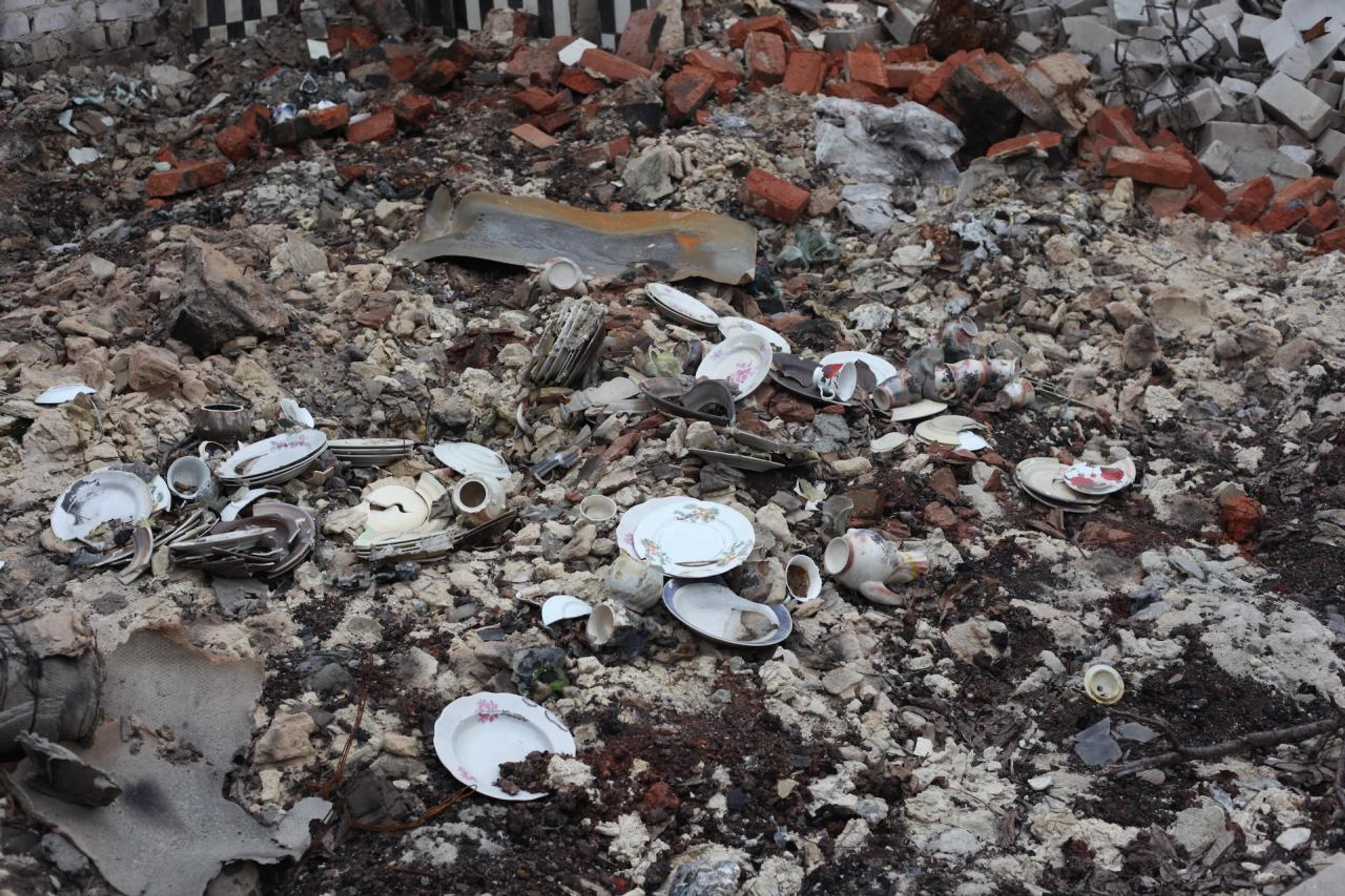 Nikita Kadan, Victory (White Shelf) , 2017, photo of melted cups found in the ruins of a house destroyed by artillery strikes in the city of Lysychansk, Donbass. &copy; 2015.