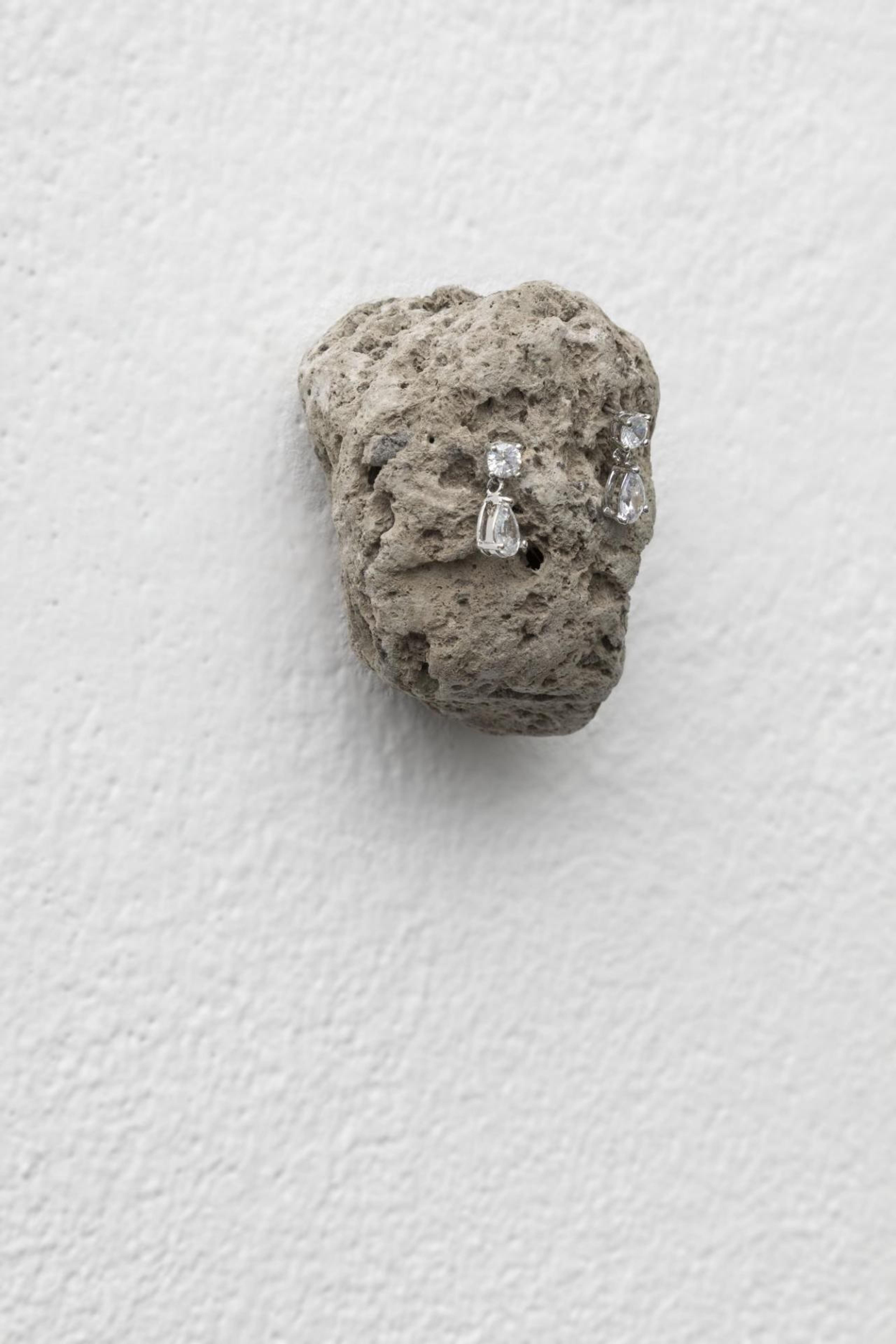 Nina Beier Crybaby , 2019 Foot scrub pumice stone, faux gemstone earrings