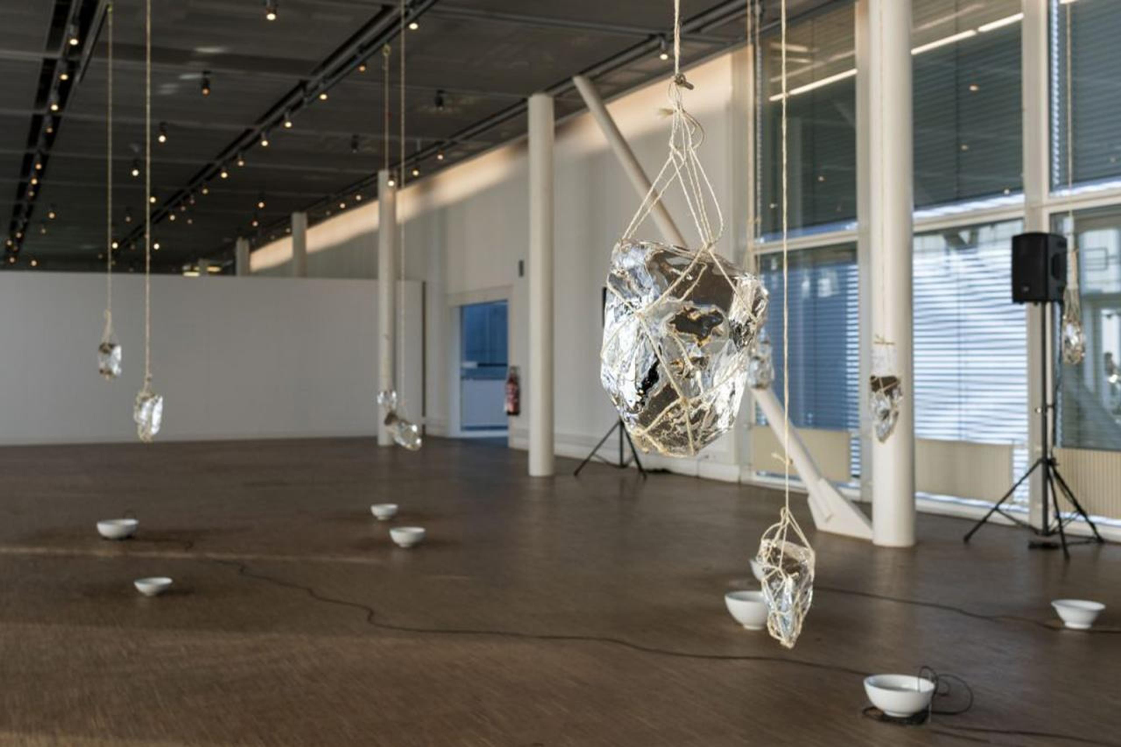 Tomoko Sauvage, In Curved Water, 2010, ice, porcelain bowls, water, ropes, hydrophones, sound system, dimensions variable