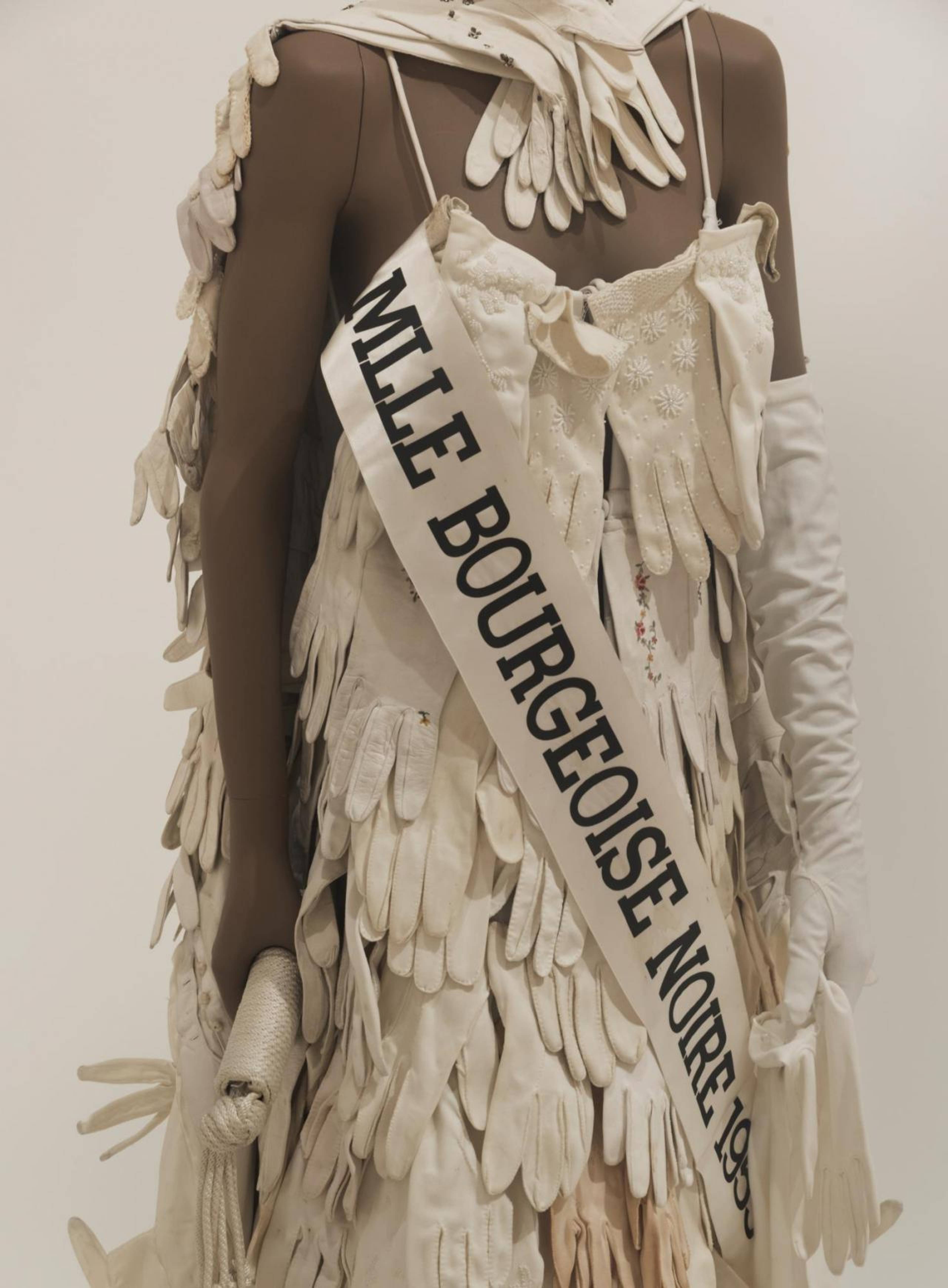 Lorraine O&#39;Grady,  Mlle Bourgeoise Noire Costume , 1980, Costume made from white gloves, shoes, tiara, sash, pair of gloves, 176 &times; 55 &times; 71 cm,