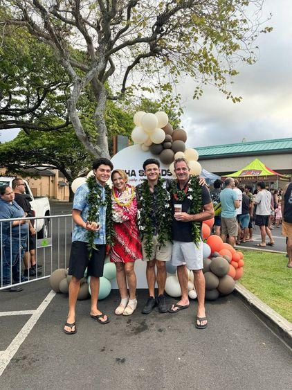 Crowd and event setup at the Aloha Salads 20th anniversary celebration