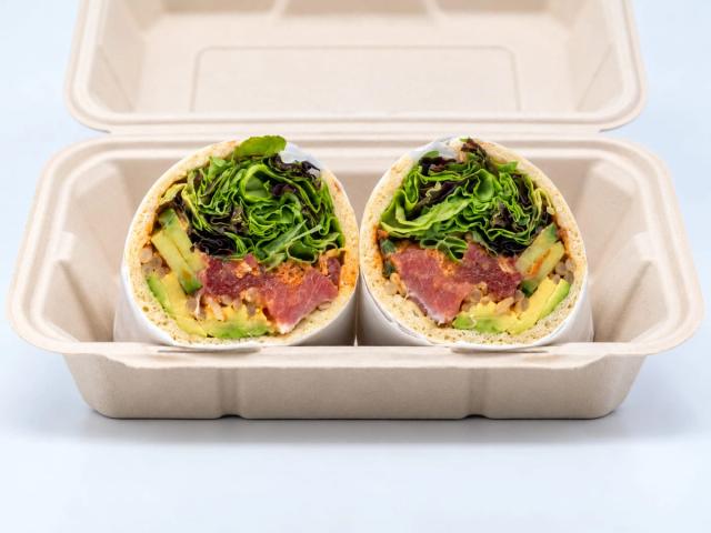 Aloha Salads Aloha Poke Wrap with spicy ahi, avocado, and greens on pita
