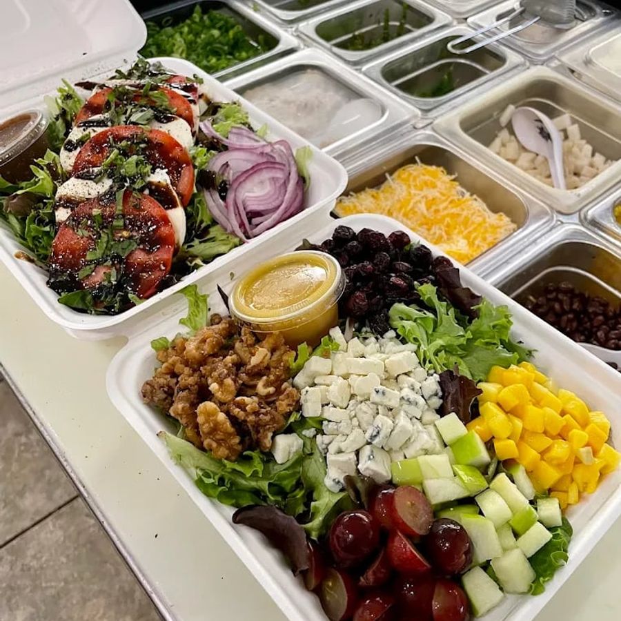 Fresh salad bowls prepared for corporate catering Fresh salad bowls prepared for corporate catering