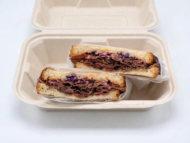 Aloha Salads Pastrami Melt with grilled pastrami, provolone, and spicy slaw on sourdough Aloha Salads Pastrami Melt with grilled pastrami, provolone, and spicy slaw on sourdough