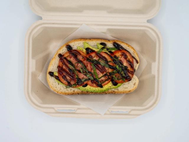 Avocado toast with tomatoes, basil, and balsamic glaze at Aloha Salads Avocado toast with tomatoes, basil, and balsamic glaze at Aloha Salads