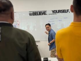 Photo of Collin delivering Pre-Ideathon content in Kapit
