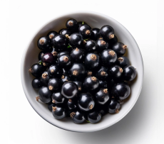 Skål med svarta vinbär