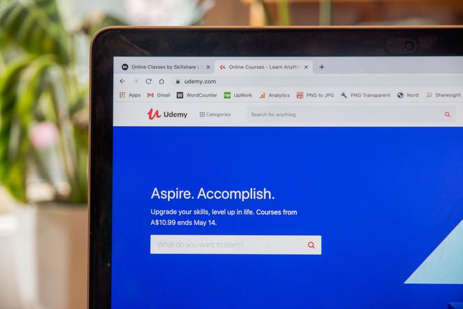 A close-up of a laptop computer screen displaying a login screen. The text on the screen says 