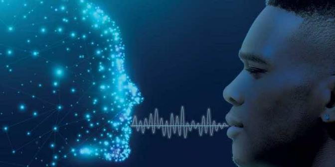 A man listening intently to a digital voice, focused and engaged in the conversation.