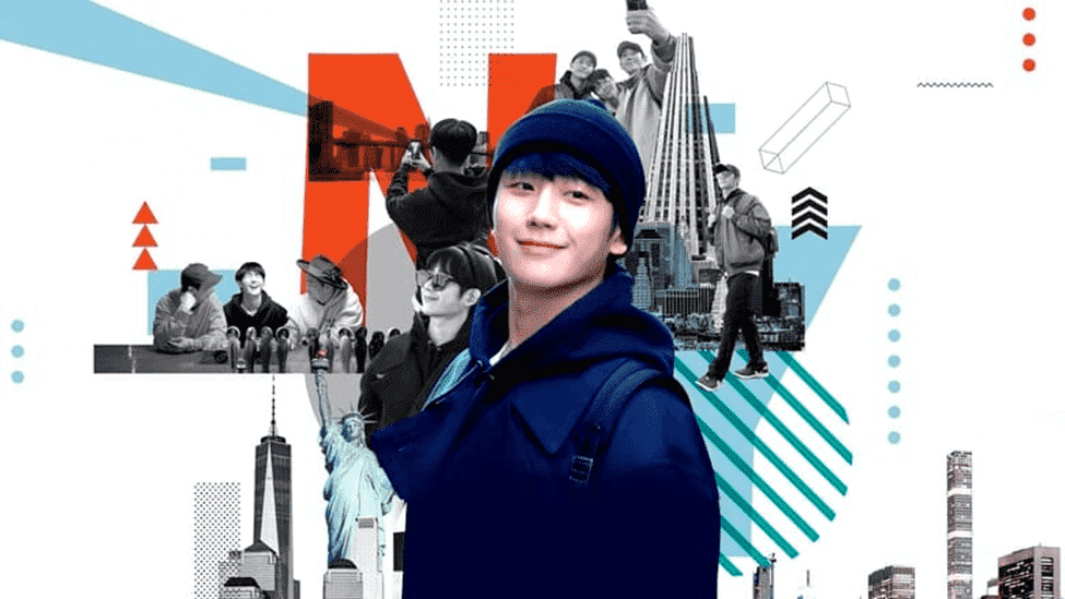 Person in a blue jacket and hat standing in front of recognizable American landmarks, highlighting the global reach of Korean artists on Netflix (represented by the red "N" logo).