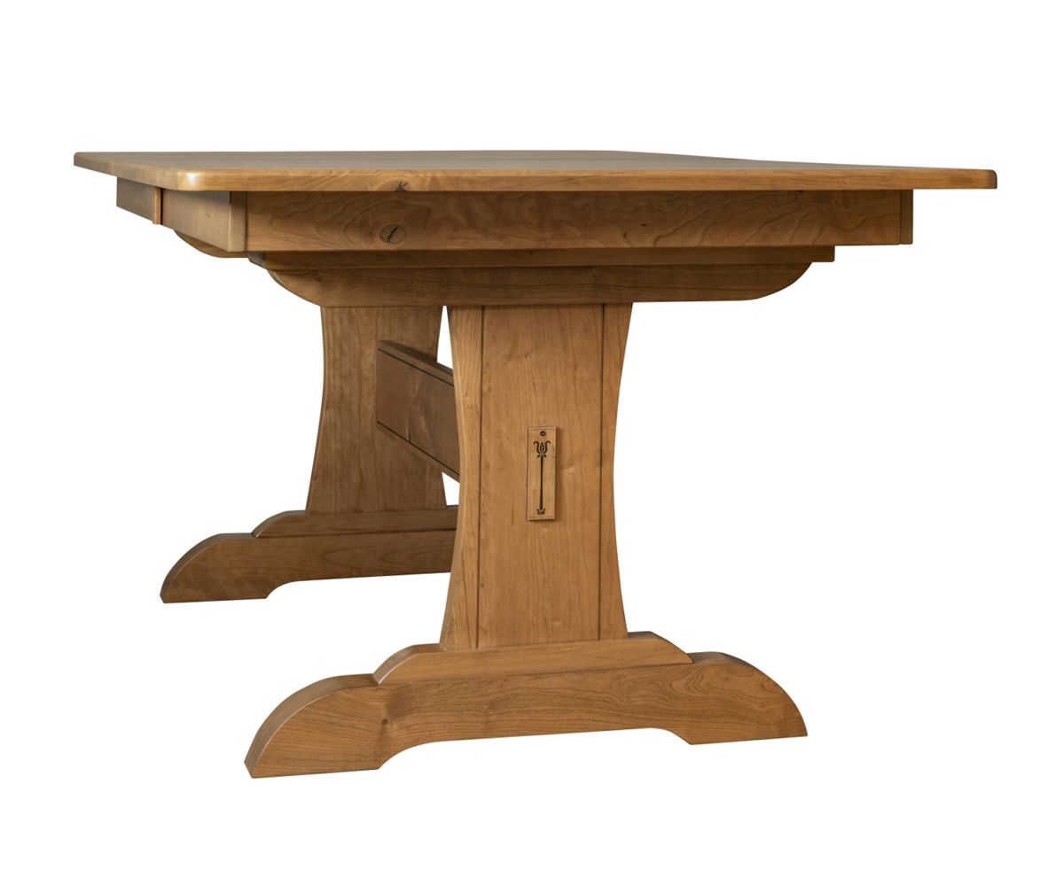 hand-rubbed finish hardwood Signature Solid Wood Trestle Dining Table With Leaves, Signature Solid Wood Trestle Dining Table With Leaves in a showroom vignette setting highlighting Signature Solid Wood Trestle Dining Table With Leaves (thumbnail 5 of 6).