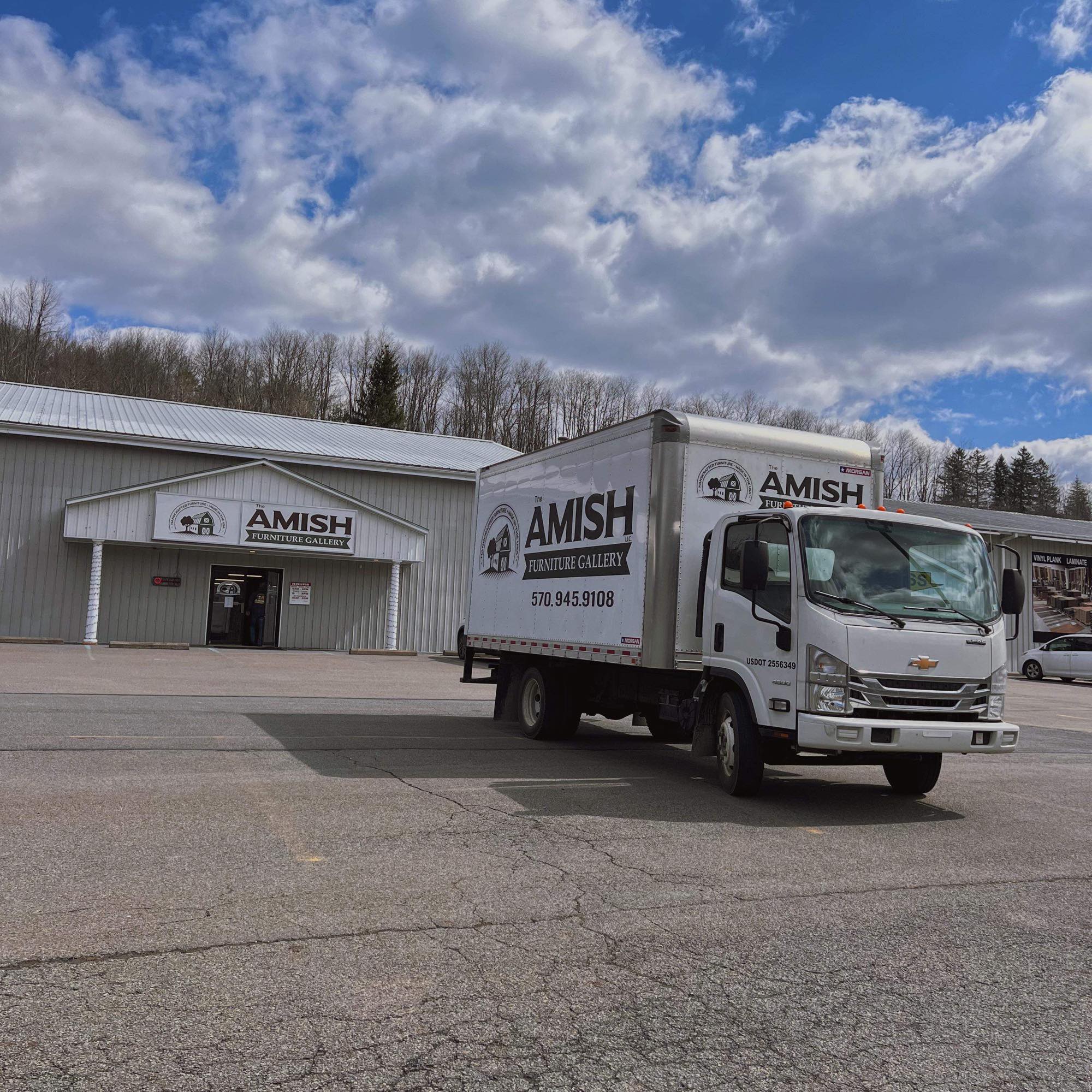 hand-rubbed finish hardwood Store Front anchoring a showroom vignette scene featuring Store Front.