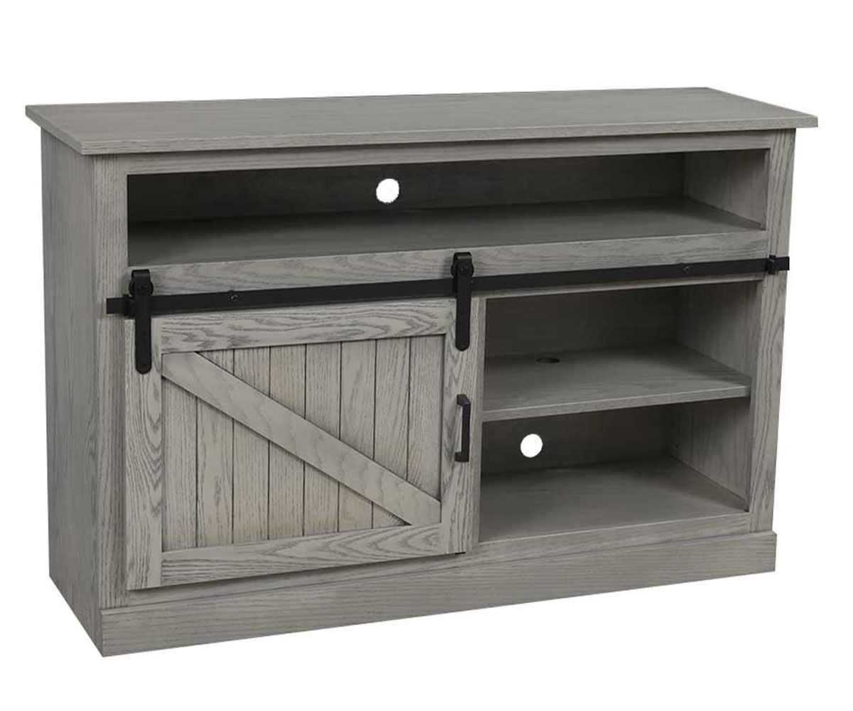 hand-rubbed finish hardwood Rustic Sliding Barn Door Tv Console, Rustic Sliding Barn Door Tv Console in a showroom vignette setting highlighting Rustic Sliding Barn Door Tv Console (thumbnail 2 of 2).