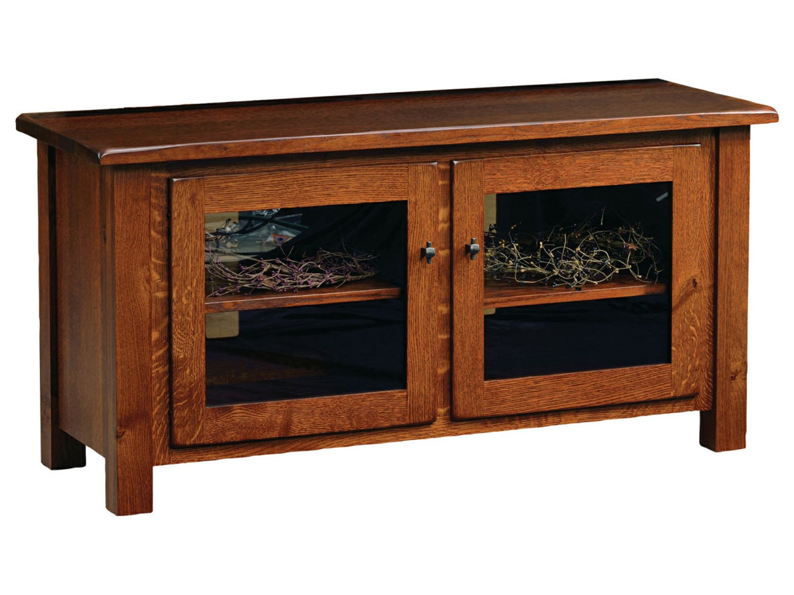 hand-rubbed finish hardwood Mission Style Glass Door Media Console With Shelf, Mission Style Glass Door Media Console With Shelf in a showroom vignette setting highlighting Mission Style Glass Door Media Console With Shelf (frame 1 of 1).