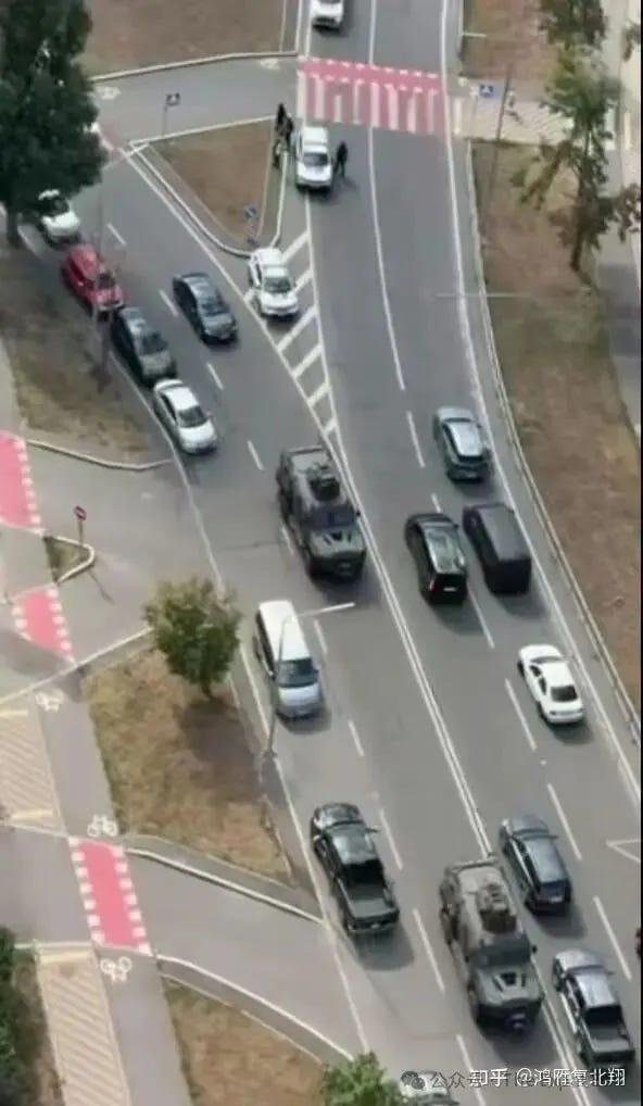 Aerial view of armored vehicles jamming a Kyiv road