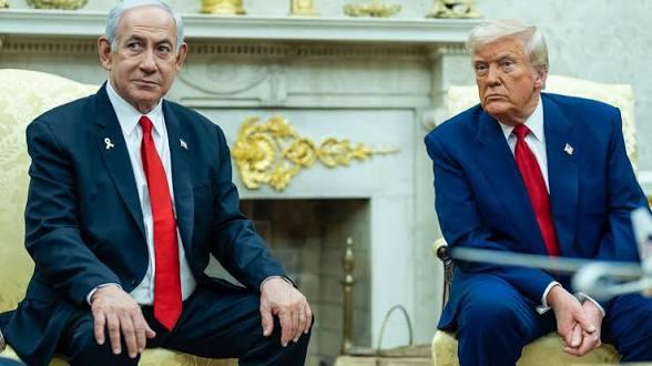 Israeli Prime Minister Benjamin Netanyahu and former President Donald Trump sitting in cream-colored armchairs in the White House, both wearing suits and looking serious.