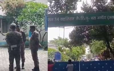 असम के CRPF कैंप में गोलीबारी के बाद सुरक्षा अधिकारी जांच करते हुए