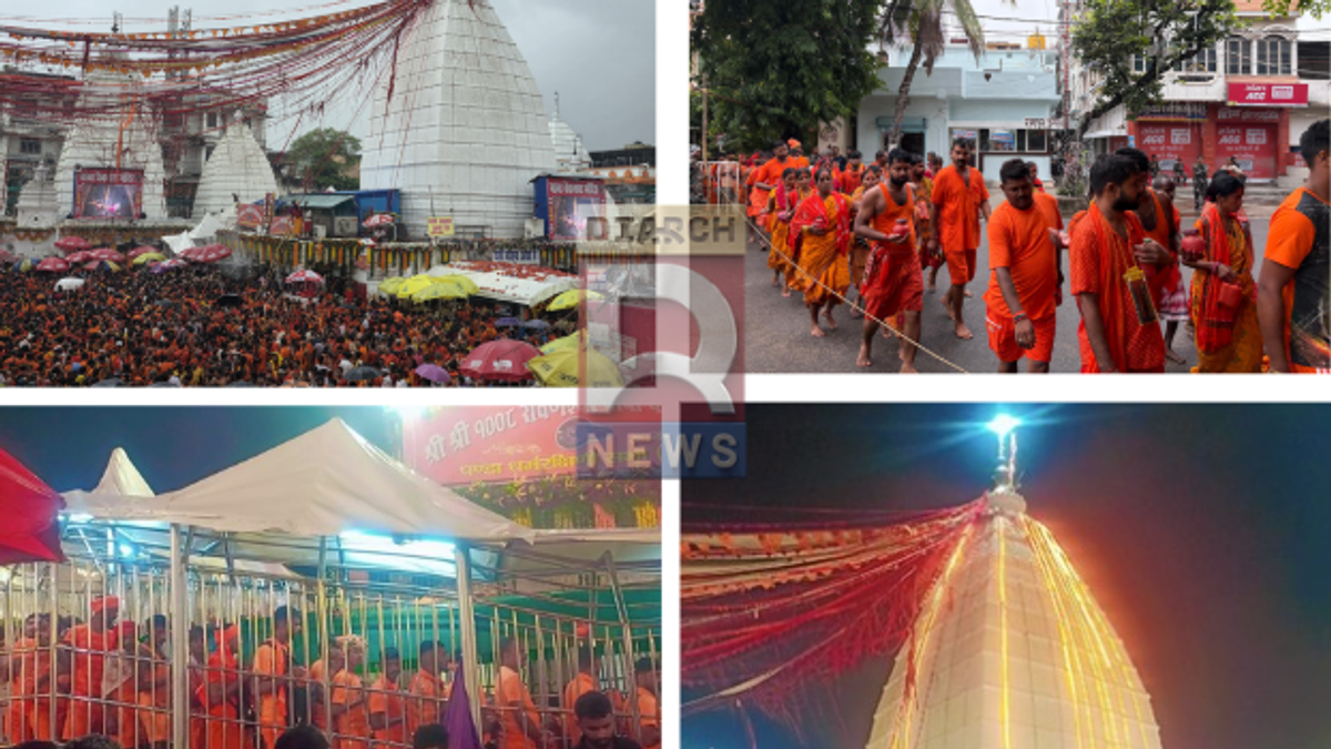देवघर में श्रावणी मेला के दौरान बारिश के बीच बाबा बैद्यनाथ मंदिर की ओर जाते कतारबद्ध कांवरिए।