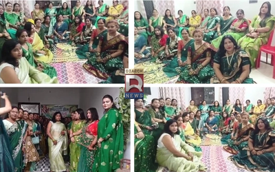 देवघर में हरियाली पर्व के दौरान हरे परिधानों में सजी सखी सहेली ग्रुप की महिलाएं