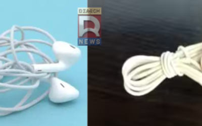 ईयरफोन की तार को उलझने से बचाने के लिए फिगर-8 तरीके से लपेटते हुए।