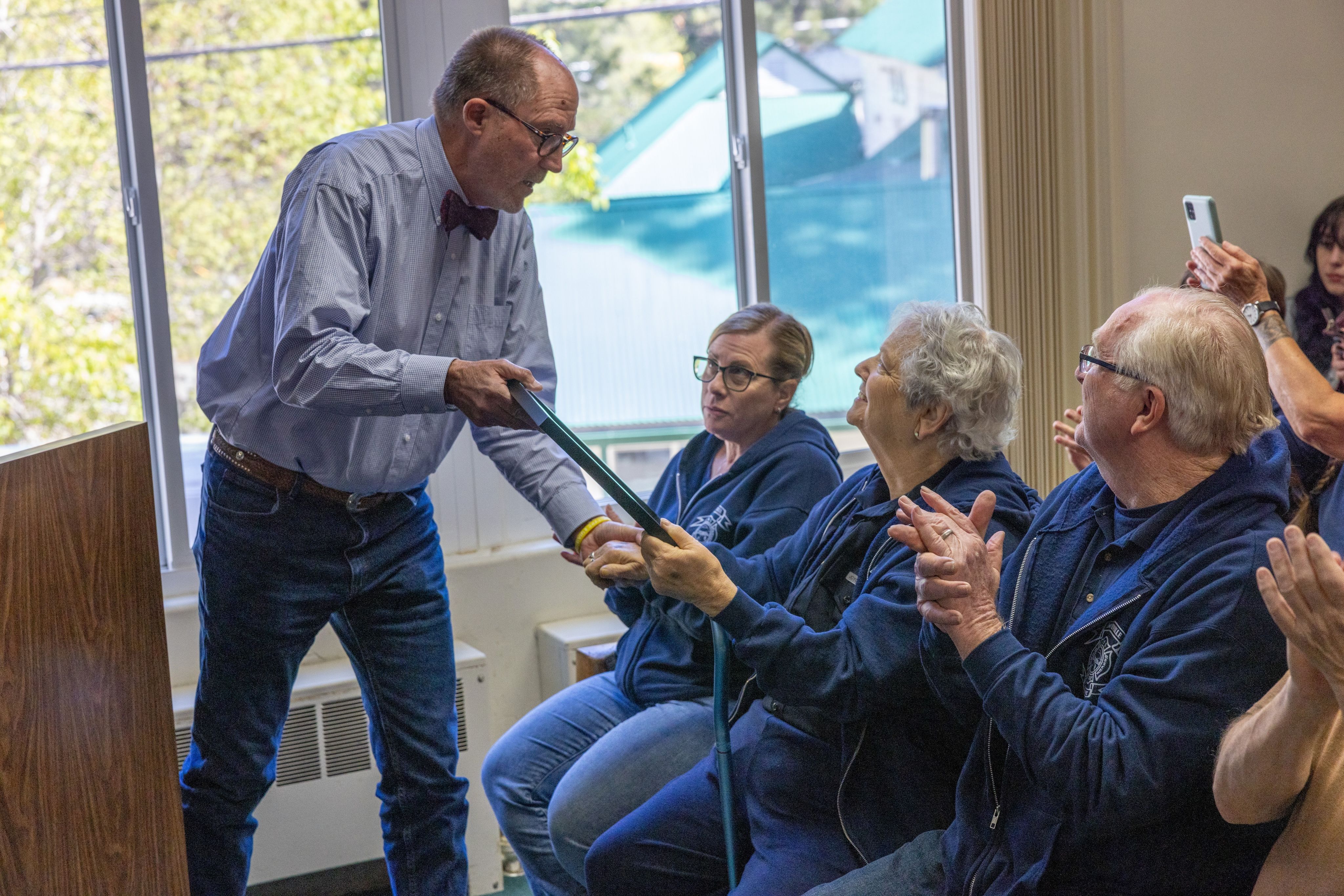 Supervisor Adams presents a Resolutions of Appreciation to White