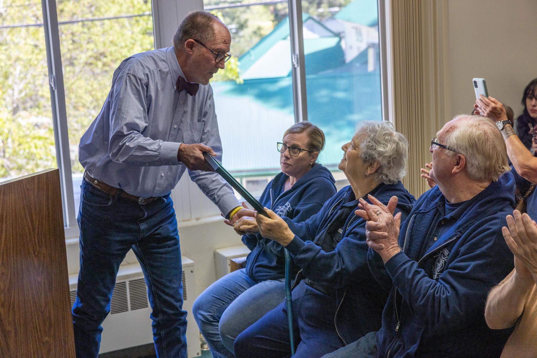 Supervisor Adams presents a Resolutions of Appreciation to White