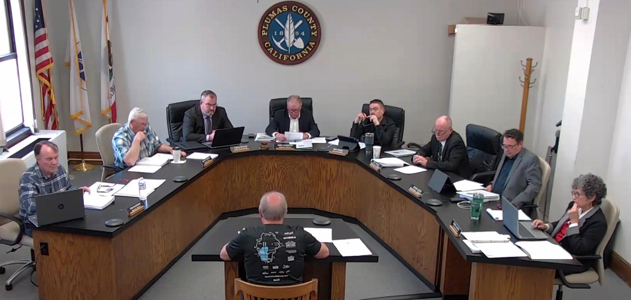 Left to right: Thomas McGowan (District 3 Supervisor), Dwight Ceresola (District 1 Supervisor), Josh Brechtel (County Counsel), Greg Hagwood (District 4 Supervisor & Chair), Allen Hiskey (Board Clerk), Jeff Engel (District 5 Supervisor), Kevin Goss (District 2 Supervisor), Debra Lucero (Chief Administrative Officer) and center front: Clint Coble.