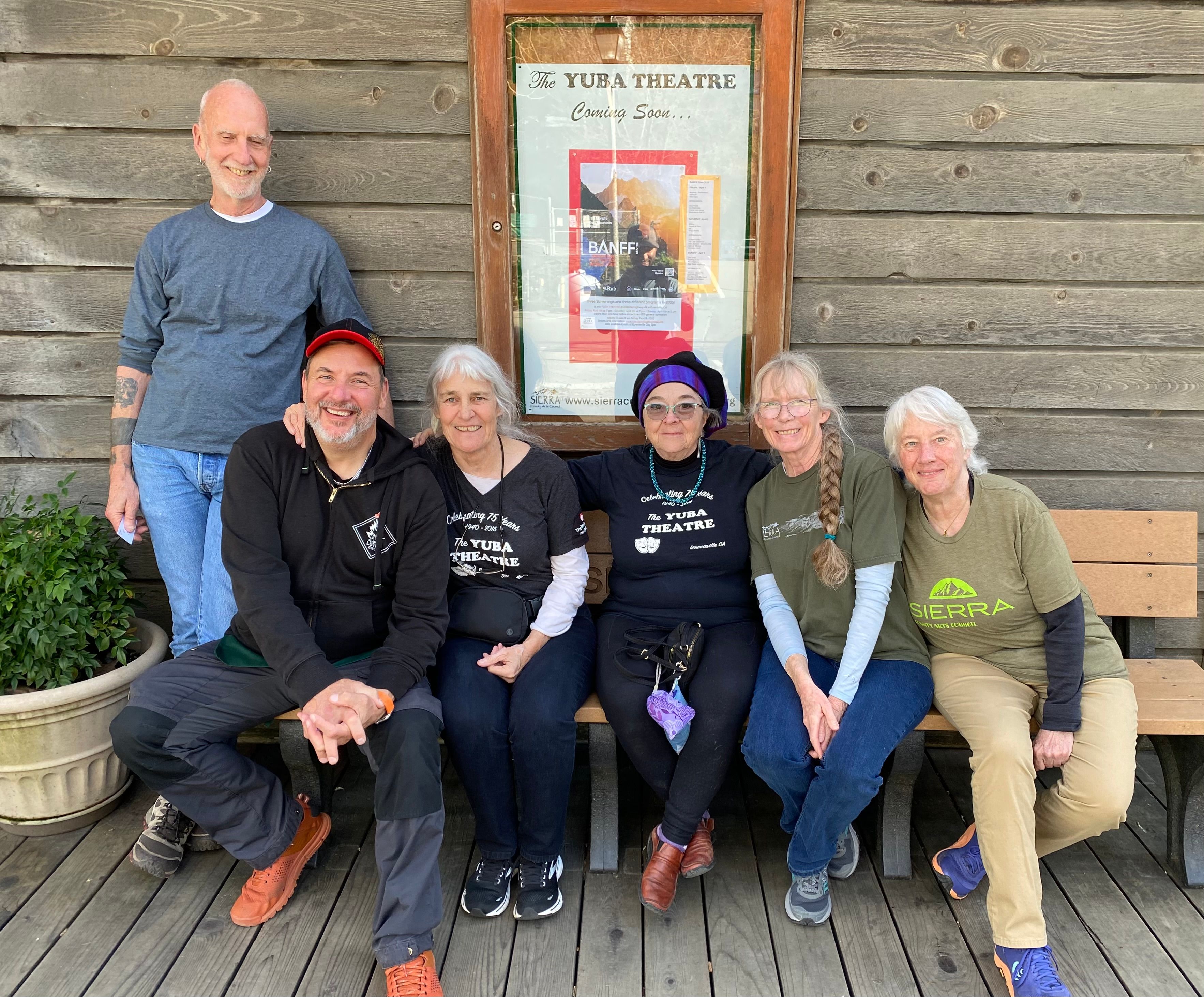 Banff Festival volunteers on the bench outside the Yuba Theatre.