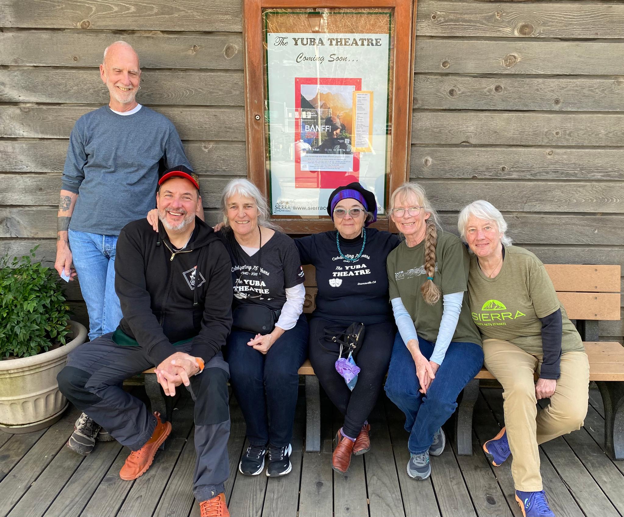 Banff Festival volunteers on the bench outside the Yuba Theatre.