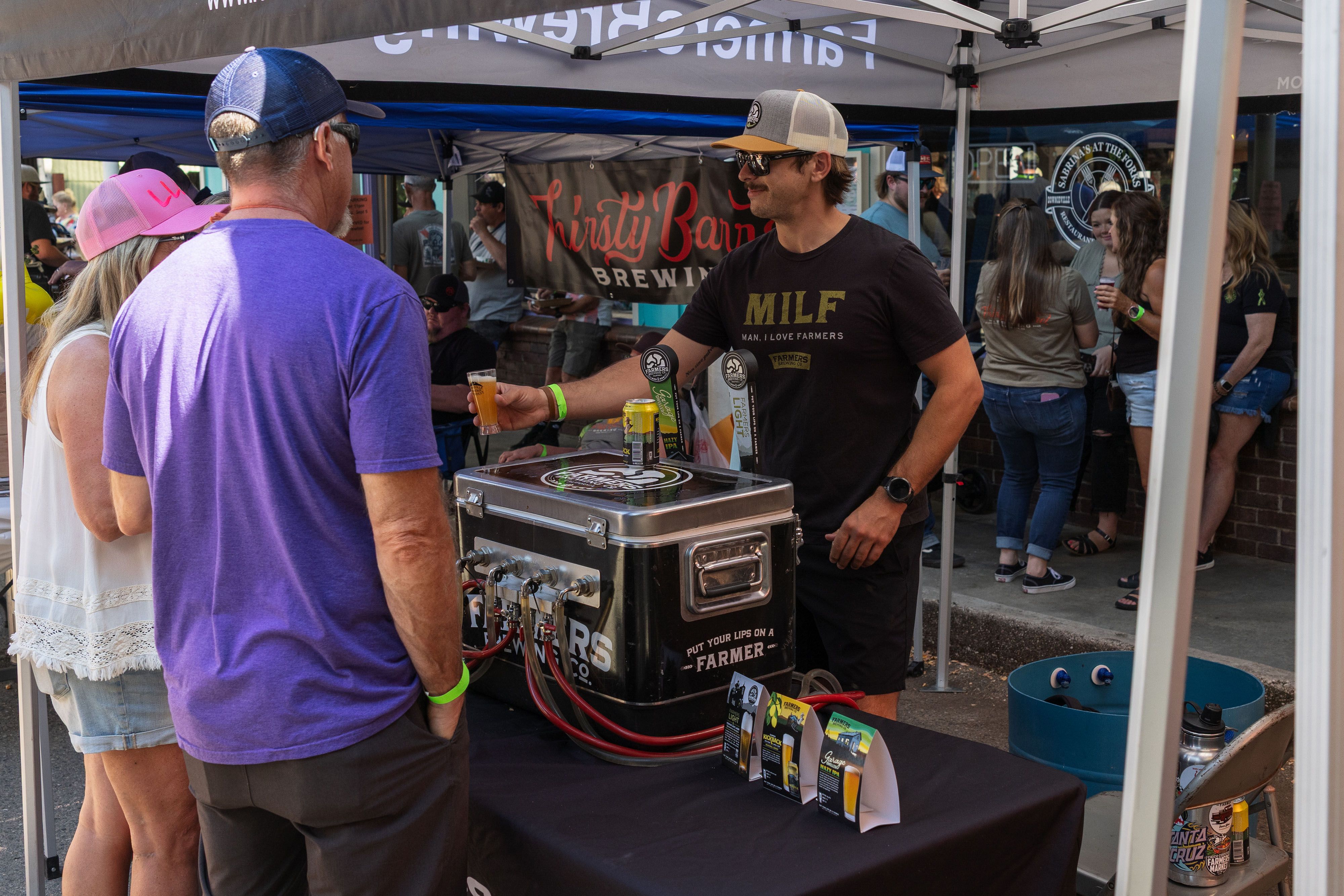 A Farmers Brewing Co. sample is distributed.