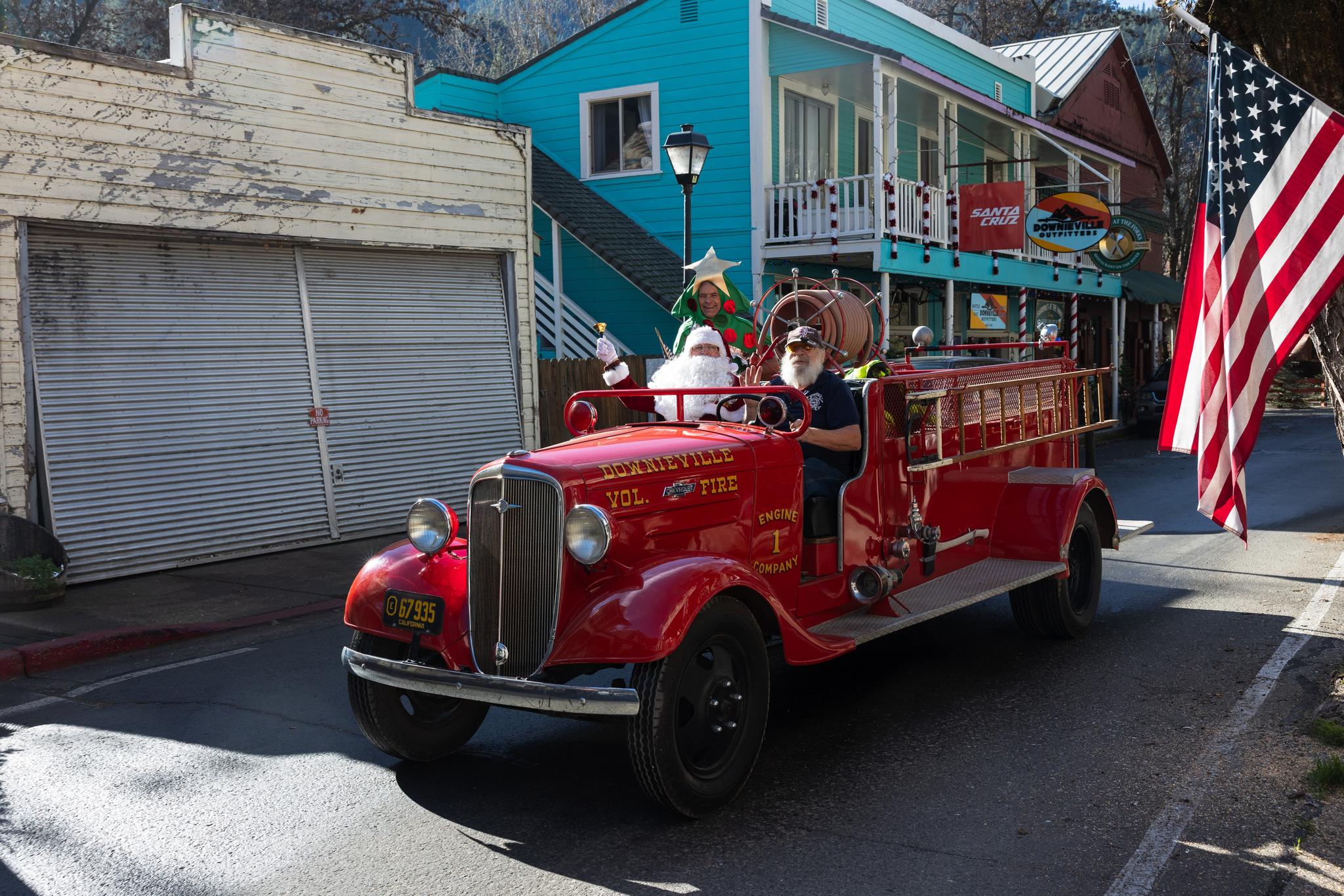 Santa and a Christmas Tree ride in the historic Downieville Volunteer Fire Department engine.