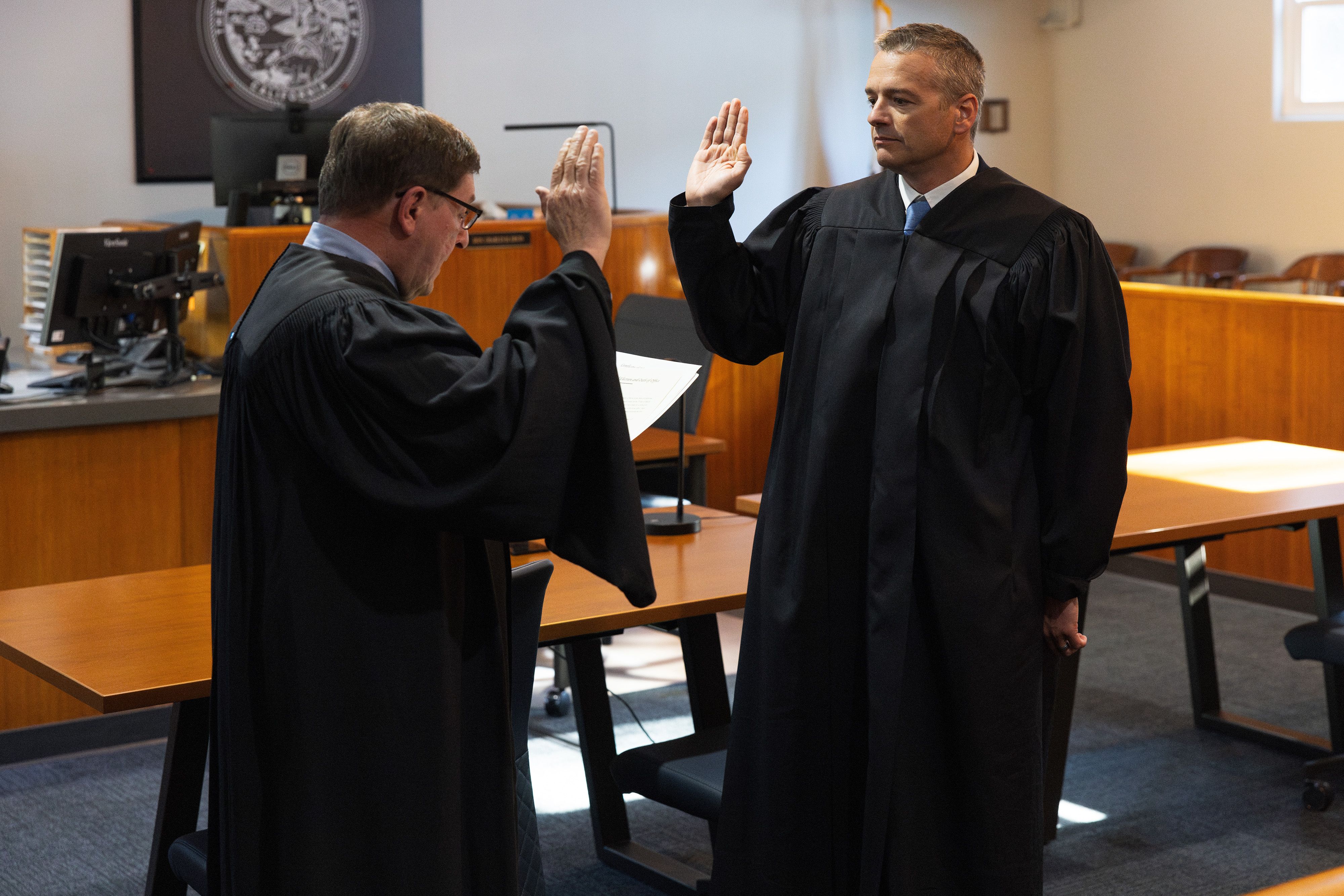 Jason LaChance (right) being sworn in by Charles H. Ervin in the Sierra County Courtroom in Downieville