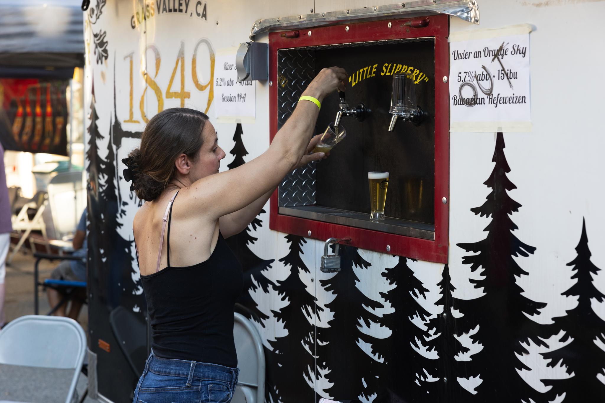 1849 Brewing Co. pours an India Pale Ale sample after running out of Hefeweizen
