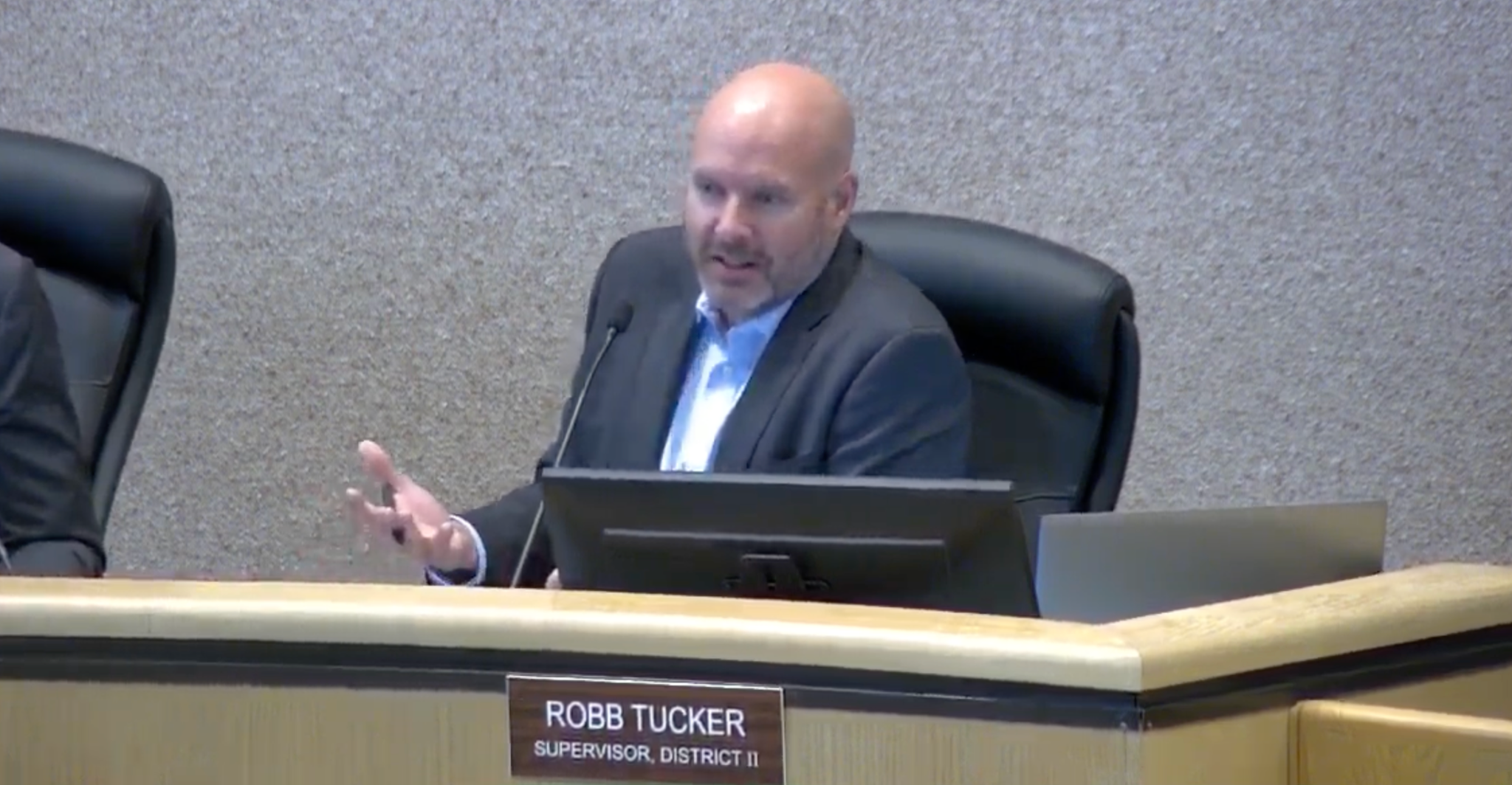 Supervisor Robb Tucker addresses commenters during Tuesday’s public meeting.