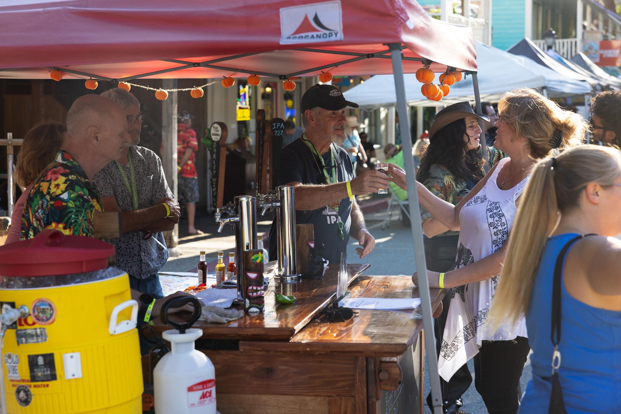 The Nevada County Homebrewers hand out a sample.